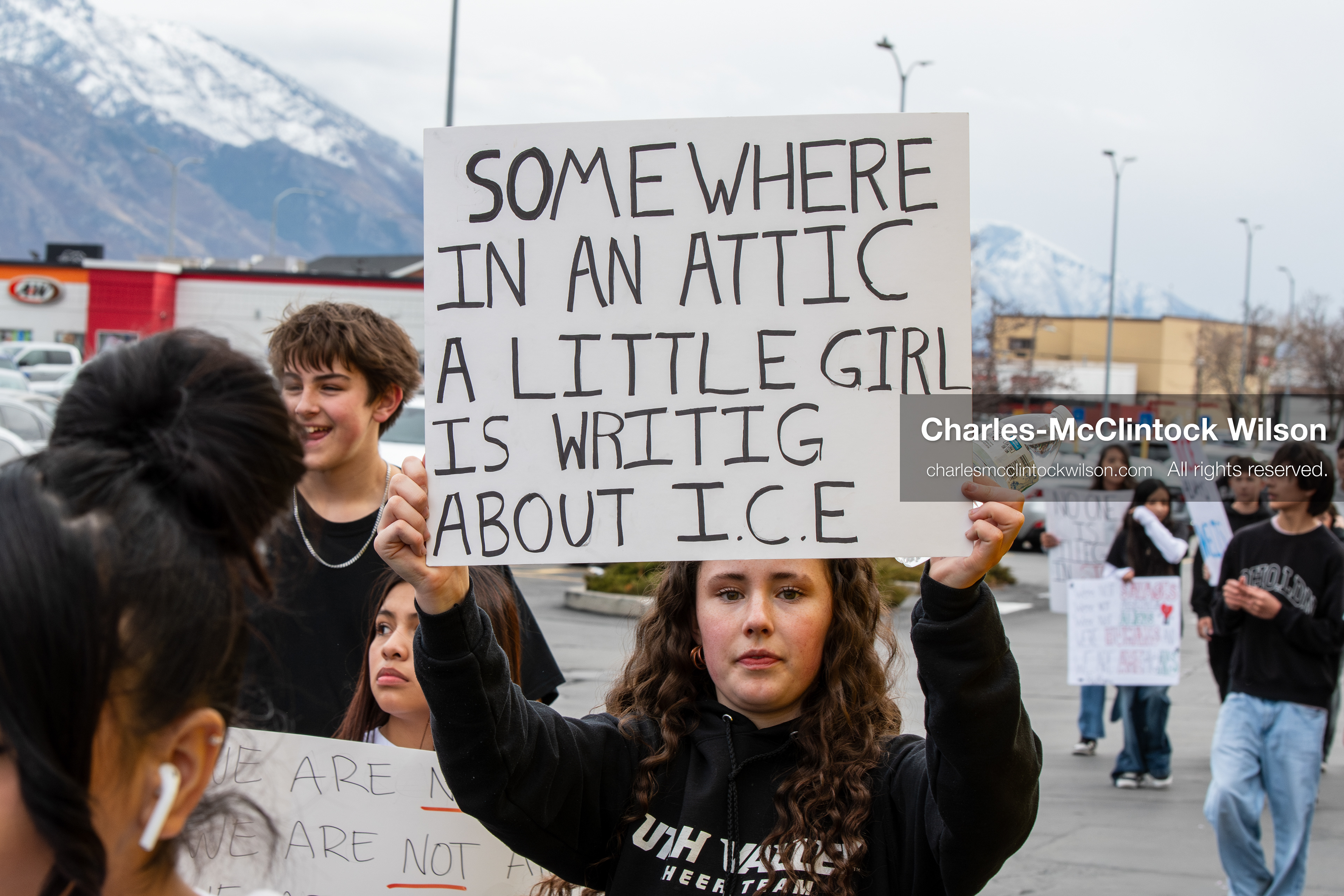 February 11, 2026, Orem, Utah, USA: A student stands along State Street during a student‑led protest involving participants from multiple Orem schools. (Credit Image: © Charles‑McClintock Wilson/ZUMA Press Wire)