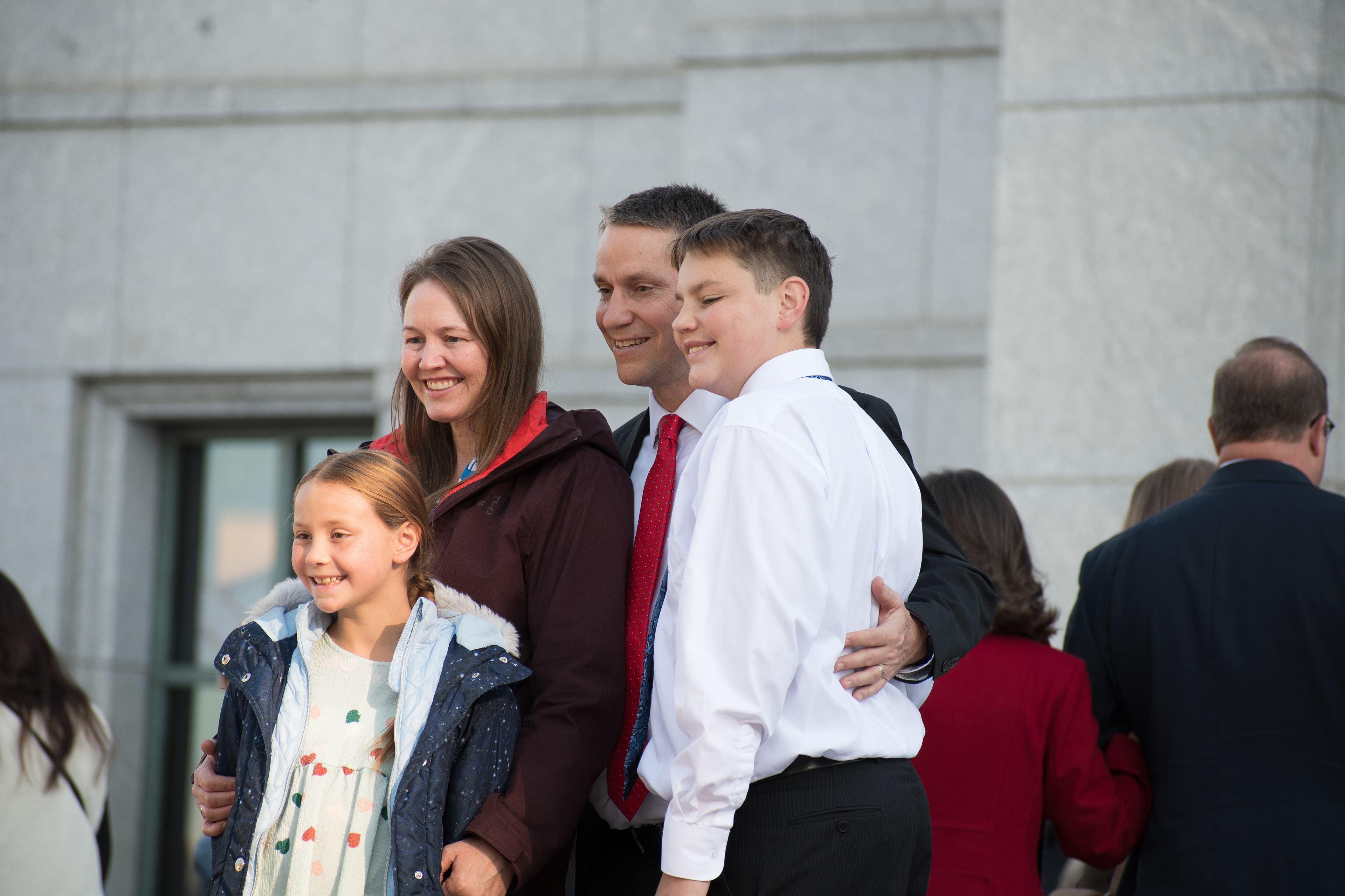 October 6, 2025, Salt Lake City, Utah, USA: A family poses for a photo outside the Conference Center during the public viewing for Russell M. Nelson, the 17th president of the Church of Jesus Christ of Latter-day Saints. Nelson died at his home in Salt Lake City, Utah, on September 27, 2025, at the age of 101. (Credit Image: © Charles-McClintock Wilson/ZUMA Press Wire)
