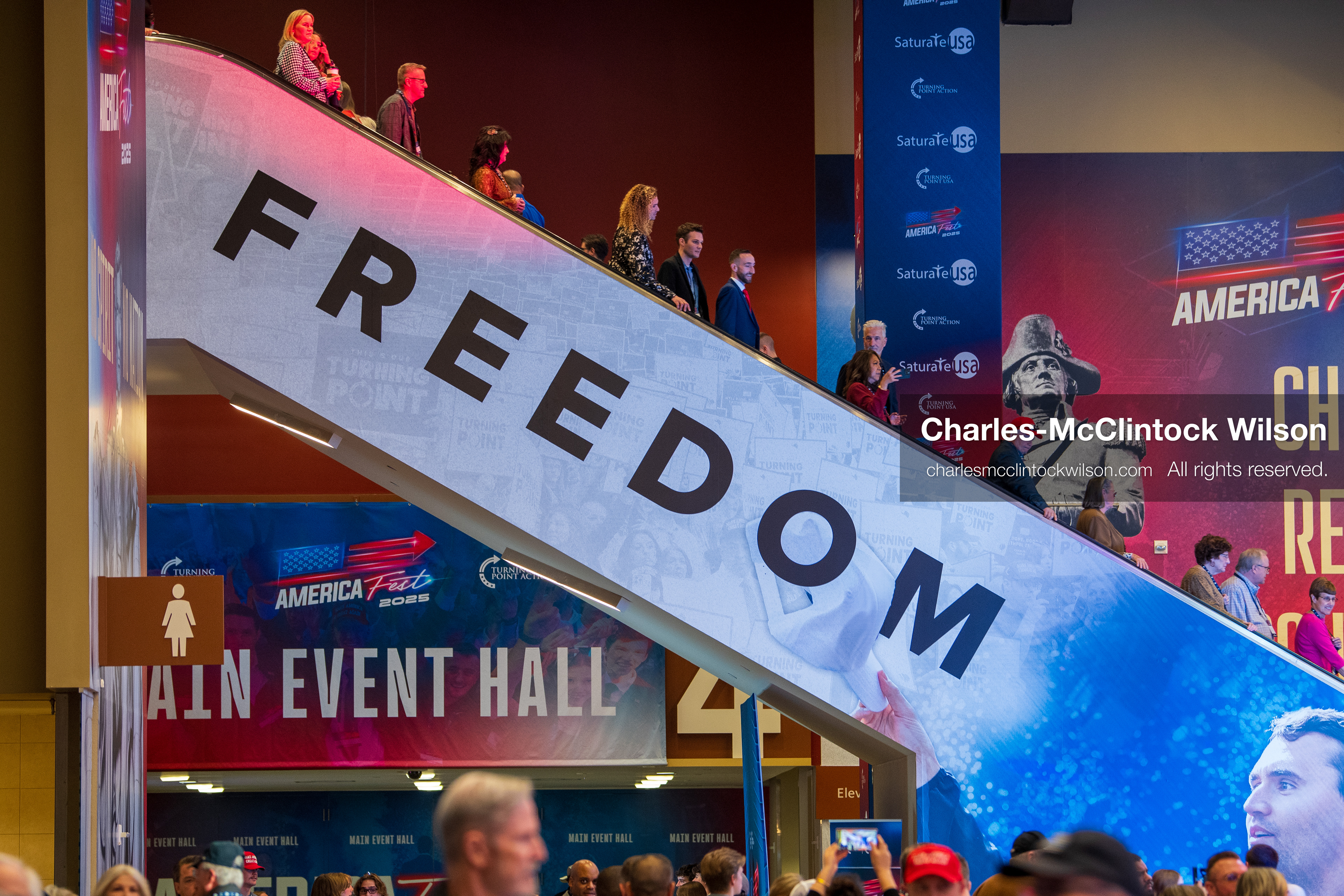 December 18, 2025, Phoenix, Arizona, USA: Attendees ride an escalator into the main hall during Turning Point USA's AmericaFest 2025 at the Phoenix Convention Center. (Credit Image: (c) Charles-McClintock Wilson/ZUMA Press Wire)