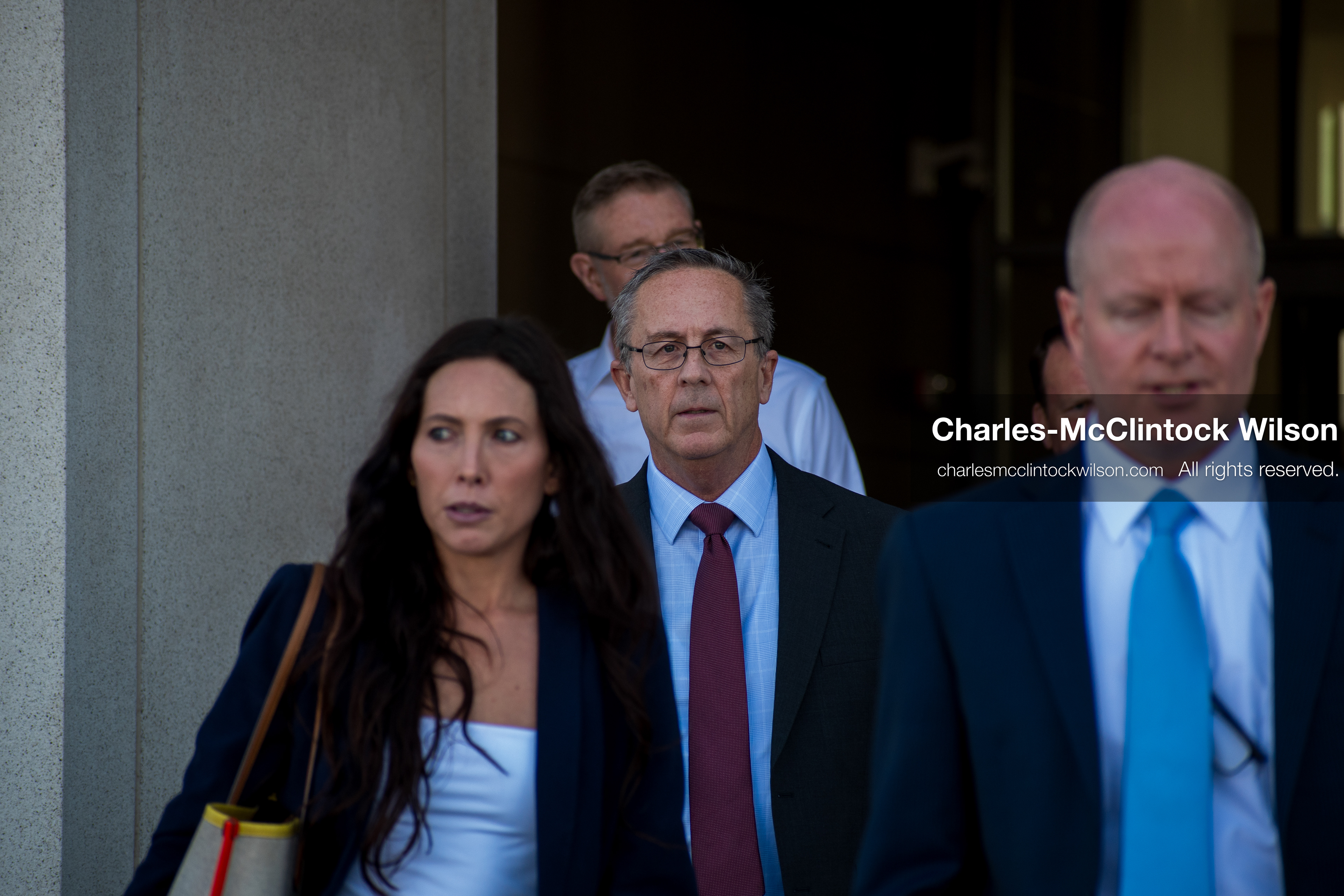 SEPTEMBER 29, 2025 — PROVO, UTAH, USA: Utah County Attorney Jeffrey Gray, center, walks with colleagues outside the Utah County Court ahead of a waiver hearing for Tyler Robinson. Robinson, charged with aggravated murder in the September 10 shooting death of conservative activist Charlie Kirk at Utah Valley University, appeared virtually for the proceedings. (Credit Image: © Charles‑McClintock Wilson / ZUMA Press Wire)