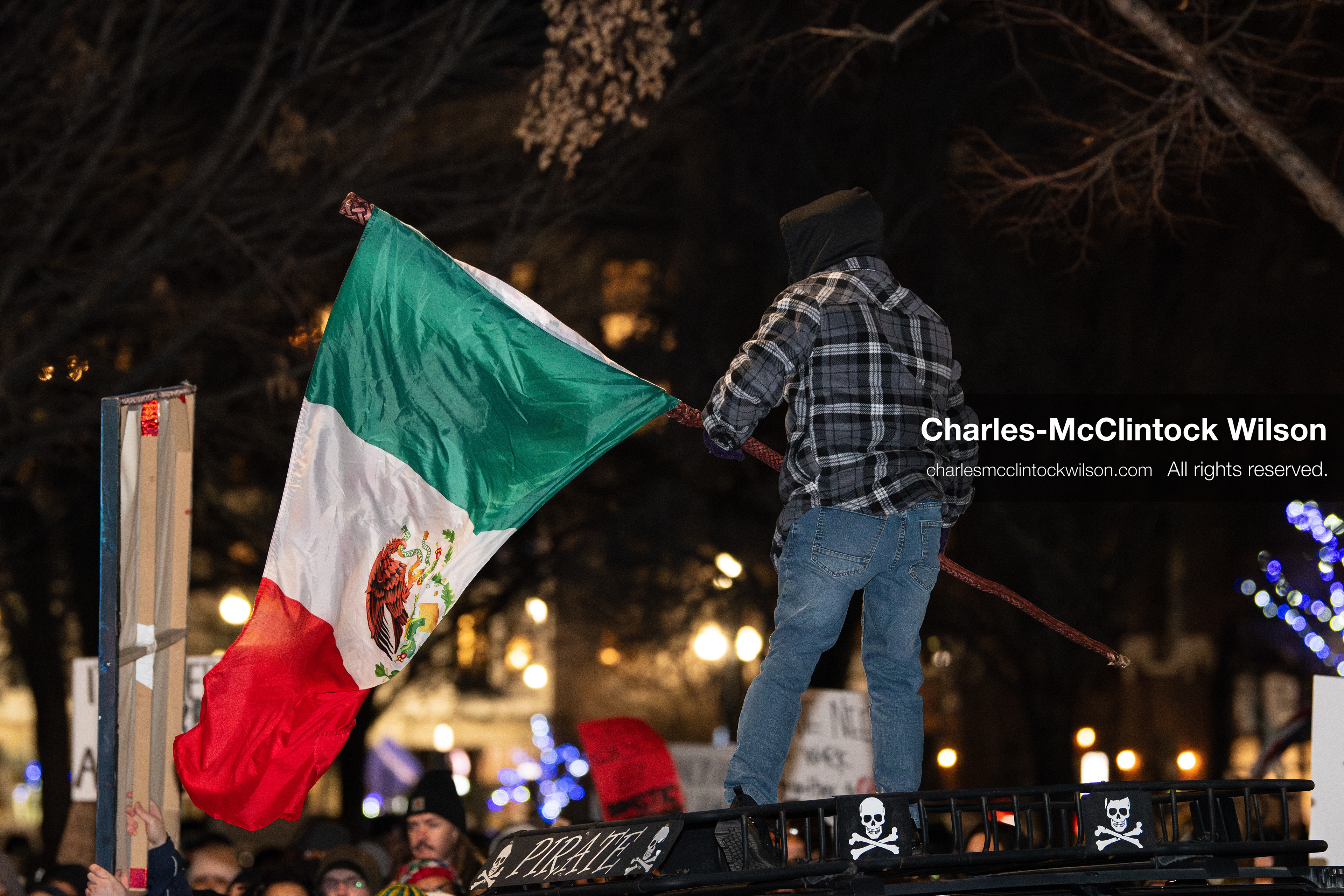 January 8, 2026, Salt Lake City, Utah, USA: A demonstrator waves a Mexican flag while standing on a platform during an anti ICE protest at Pioneer Park in Salt Lake City Utah on Jan 8 2026. The rally followed the death of Renee Nicole Good a Minneapolis woman who was fatally shot during an encounter with immigration authorities and drew hundreds calling for accountability and changes to enforcement practices. (Credit Image: © Charles-McClintock Wilson/ZUMA Press Wire)