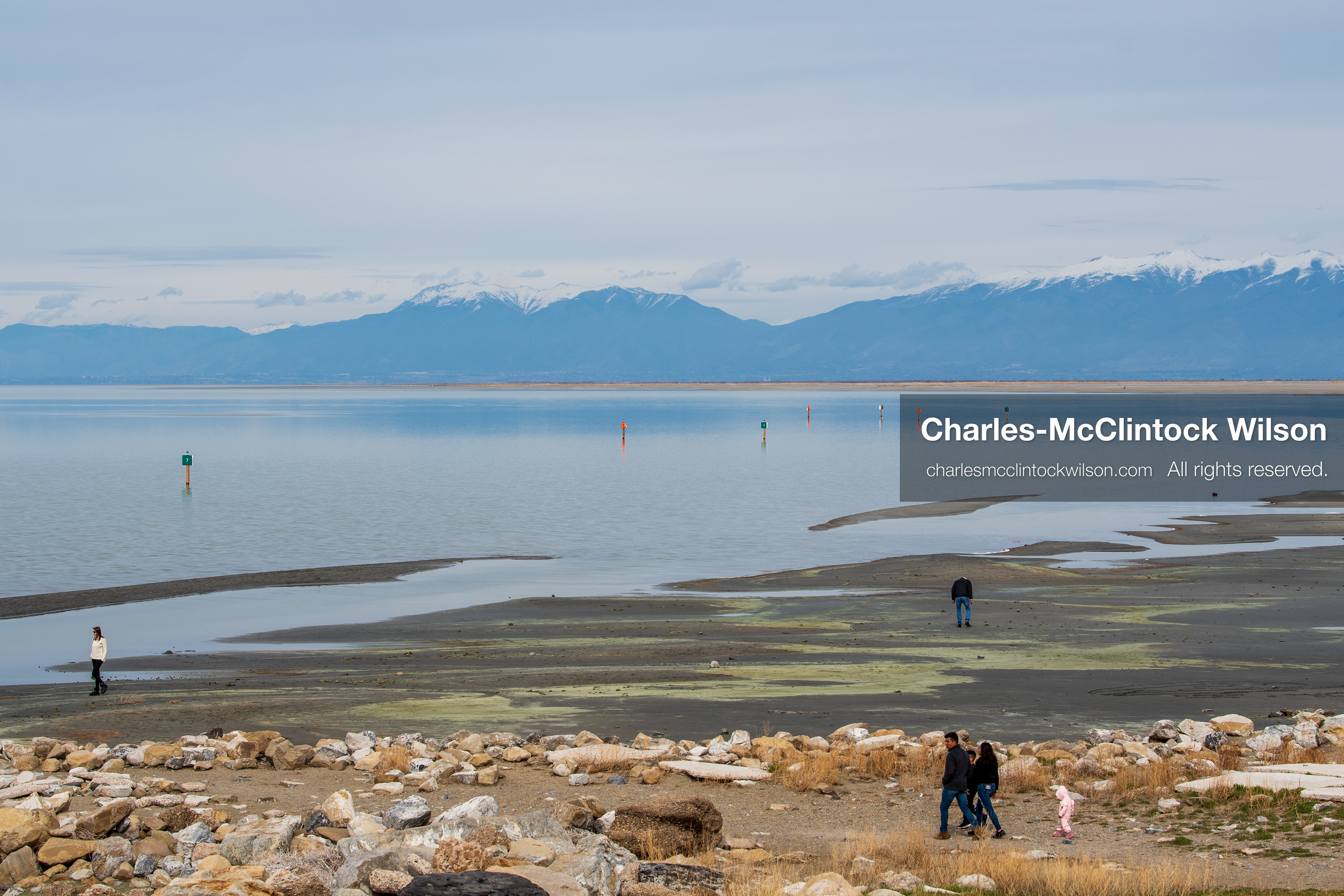 March 1, 2026, Great Salt Lake, Utah, USA: People walk along the shoreline of the Great Salt Lake as water levels remain historically low. Reports from state officials and the Great Salt Lake Strike Team state that the lake continues to fall within a serious adverse‑effects range, with elevations among the lowest recorded in more than one hundred years. The lake has drawn increased public attention as lawmakers consider large‑scale water projects and long‑term plans to address declining conditions. (Credit Image: © Charles‑McClintock Wilson/ZUMA Press Wire)