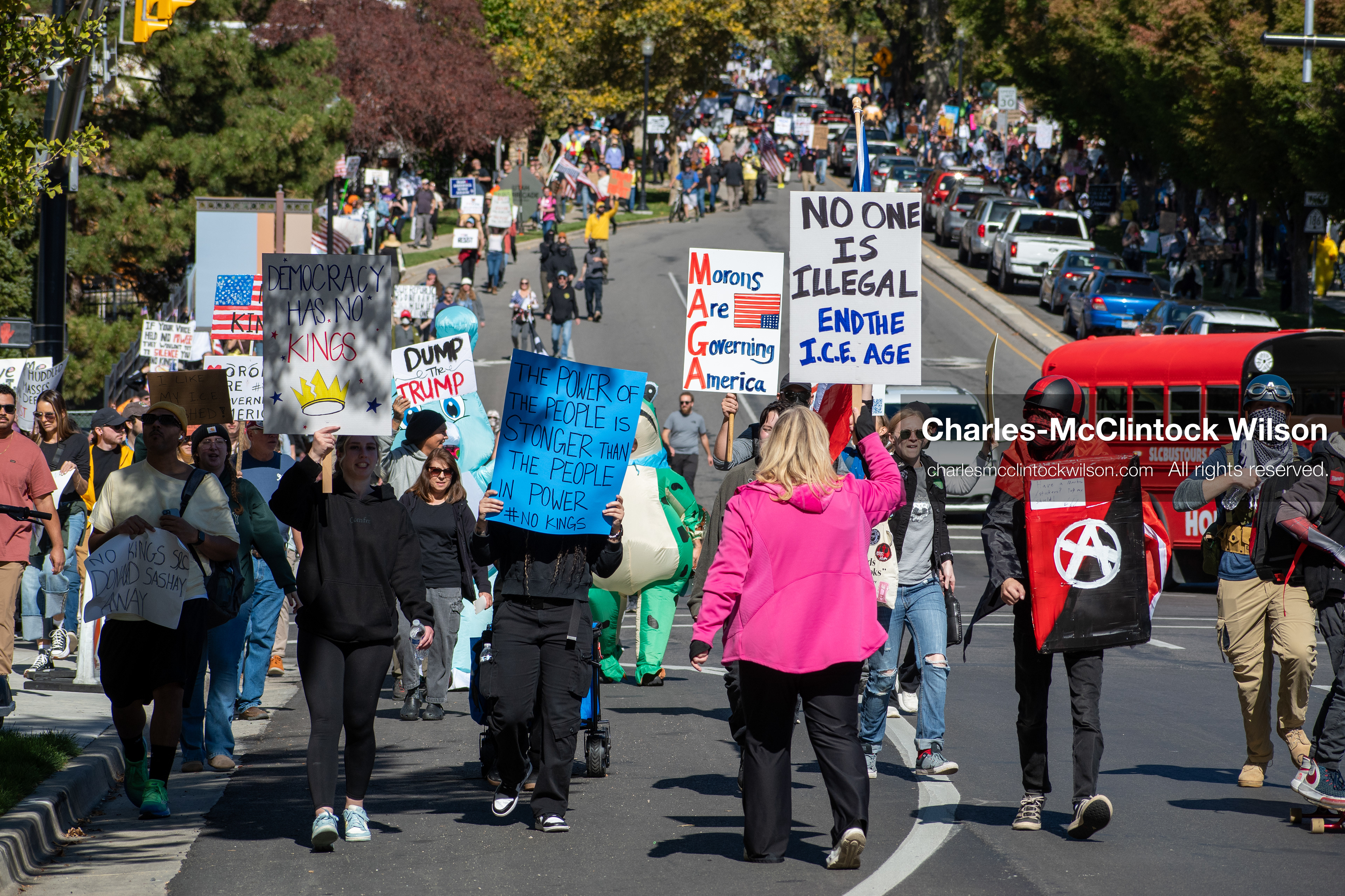 October 18, 2025, Salt Lake City, Utah, USA: Demonstrators march along South State Street during a "No Kings" protest in Salt Lake City, Utah. The protest was part of a nationwide mobilization.