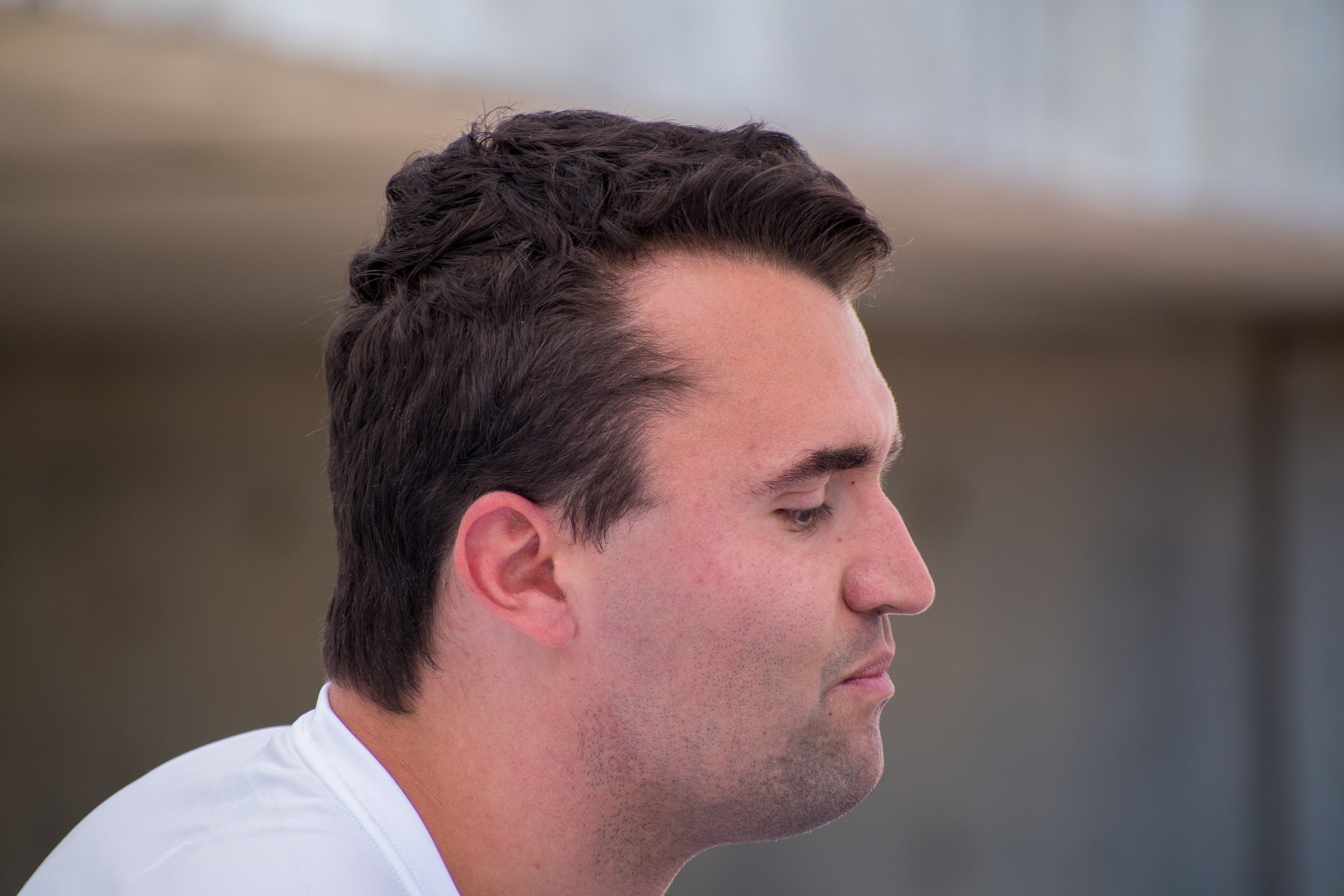 PROVO, UTAH – SEPTEMBER 10, 2025: Charlie Kirk appears focused and resolute during a public event at Utah Valley University. Captured in a moment of quiet intensity, Kirk looks off-camera as media lenses track his movements. The image reflects the tension and conviction that defined his final public appearance before the shooting incident that disrupted the event. © Charles-McClintock Wilson / ZUMA Press