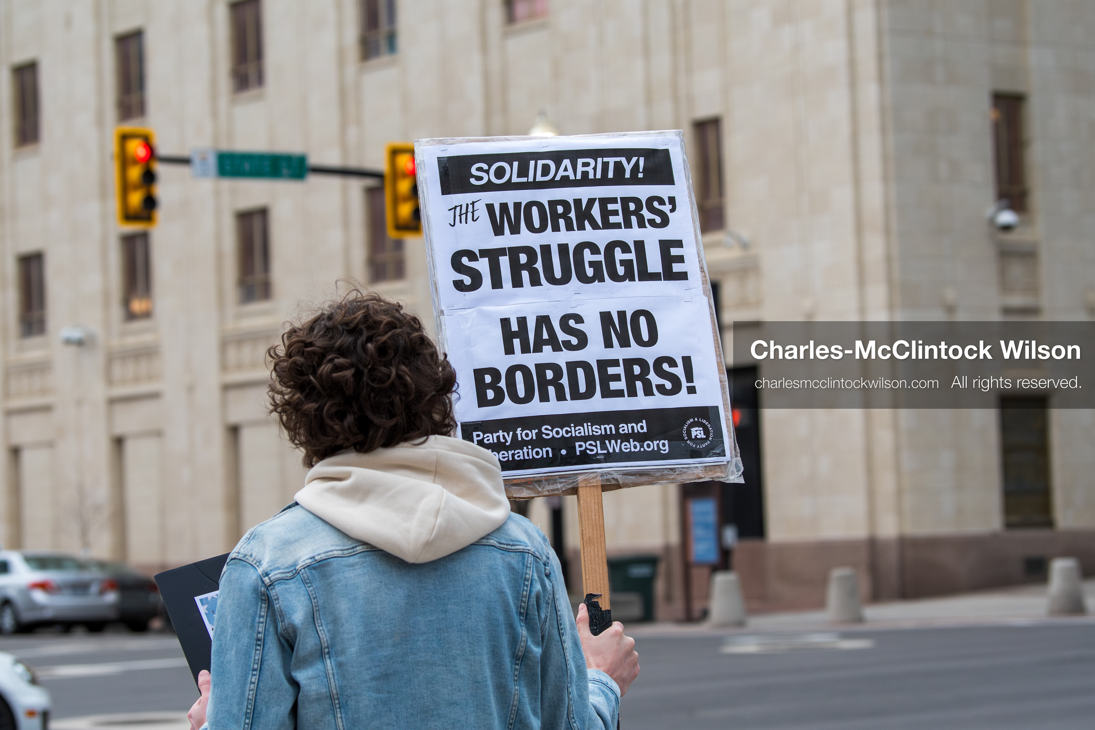January 3, 2026, Salt Lake City, Utah, USA: A protester holds a sign during a demonstration against US action in Venezuela outside the Wallace Federal Building in Salt Lake City, Utah. The protest was part of a nationwide mobilization responding to recent military developments. (Credit Image: (c) Charles‑McClintock Wilson/ZUMA Press Wire)