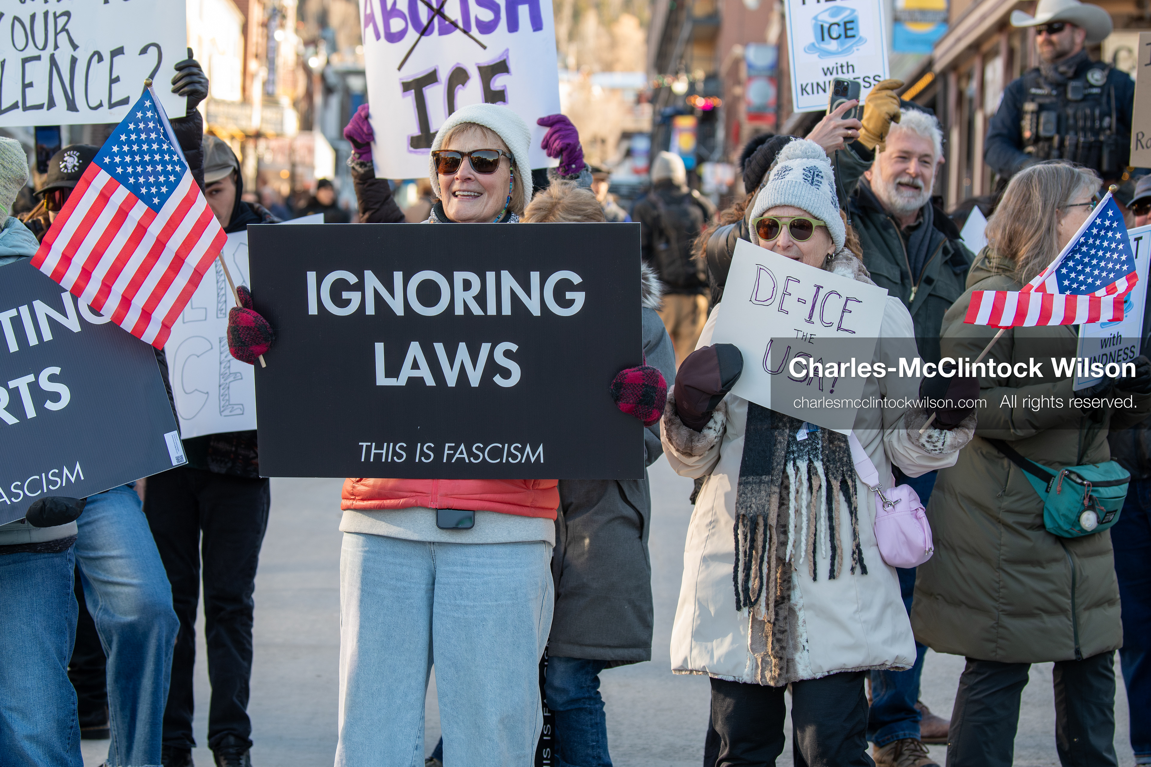 January 26, 2026, Park City, Utah, USA: Demonstrators gather on Main Street holding signs and American flags during a protest opposing U.S. Immigration and Customs Enforcement (I.C.E.) ICE agents at the Sundance Film Festival in Park City, Utah, on Monday, Jan. 26, 2026. The event was held in response to the fatal shooting of Alex Pretti by a U.S. Border Patrol officer in Minneapolis. (Credit Image: © Charles McClintock Wilson/ZUMA Press Wire)
