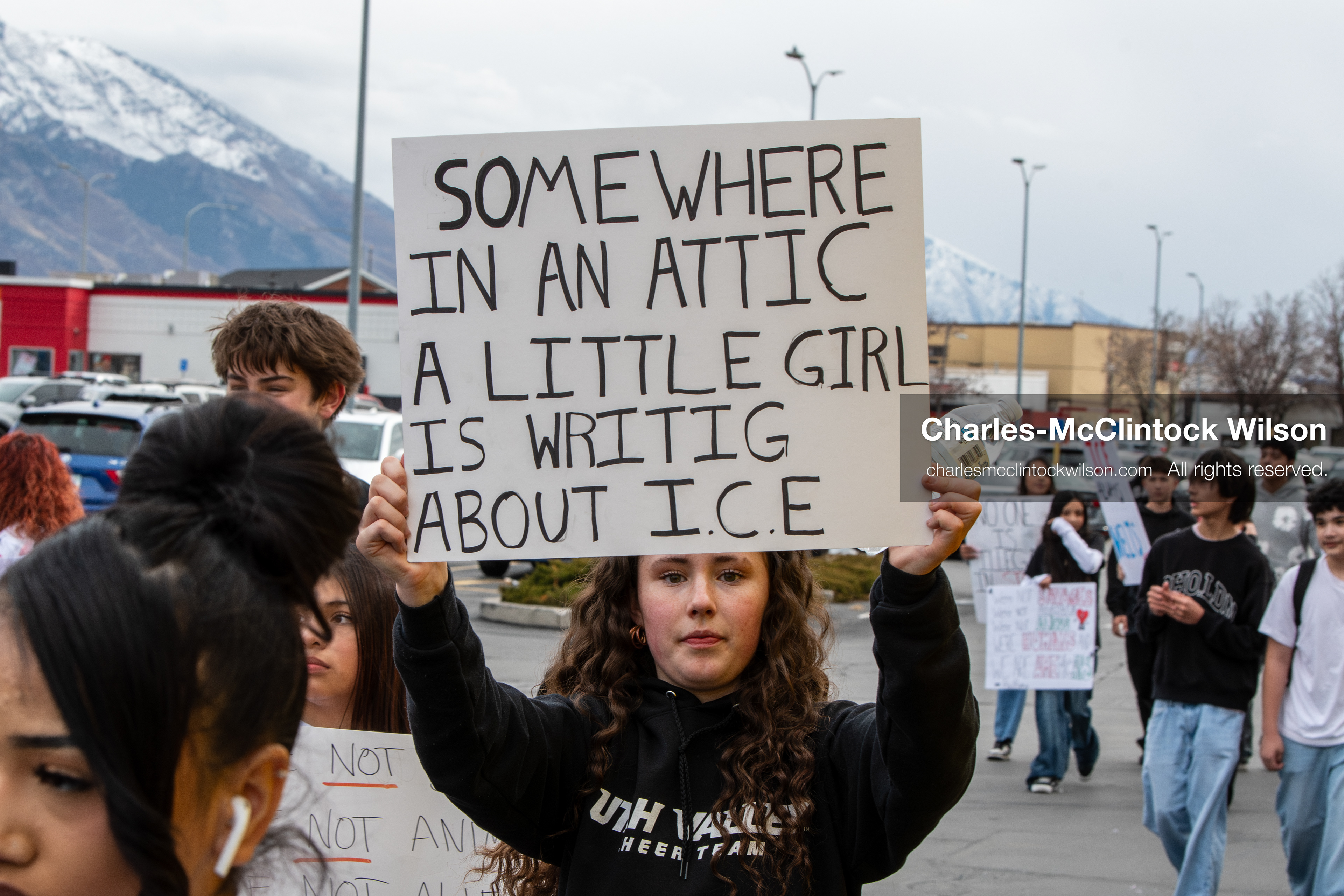 February 11, 2026, Orem, Utah, USA: A student stands along State Street during a student‑led protest involving participants from multiple Orem schools. (Credit Image: © Charles‑McClintock Wilson/ZUMA Press Wire)