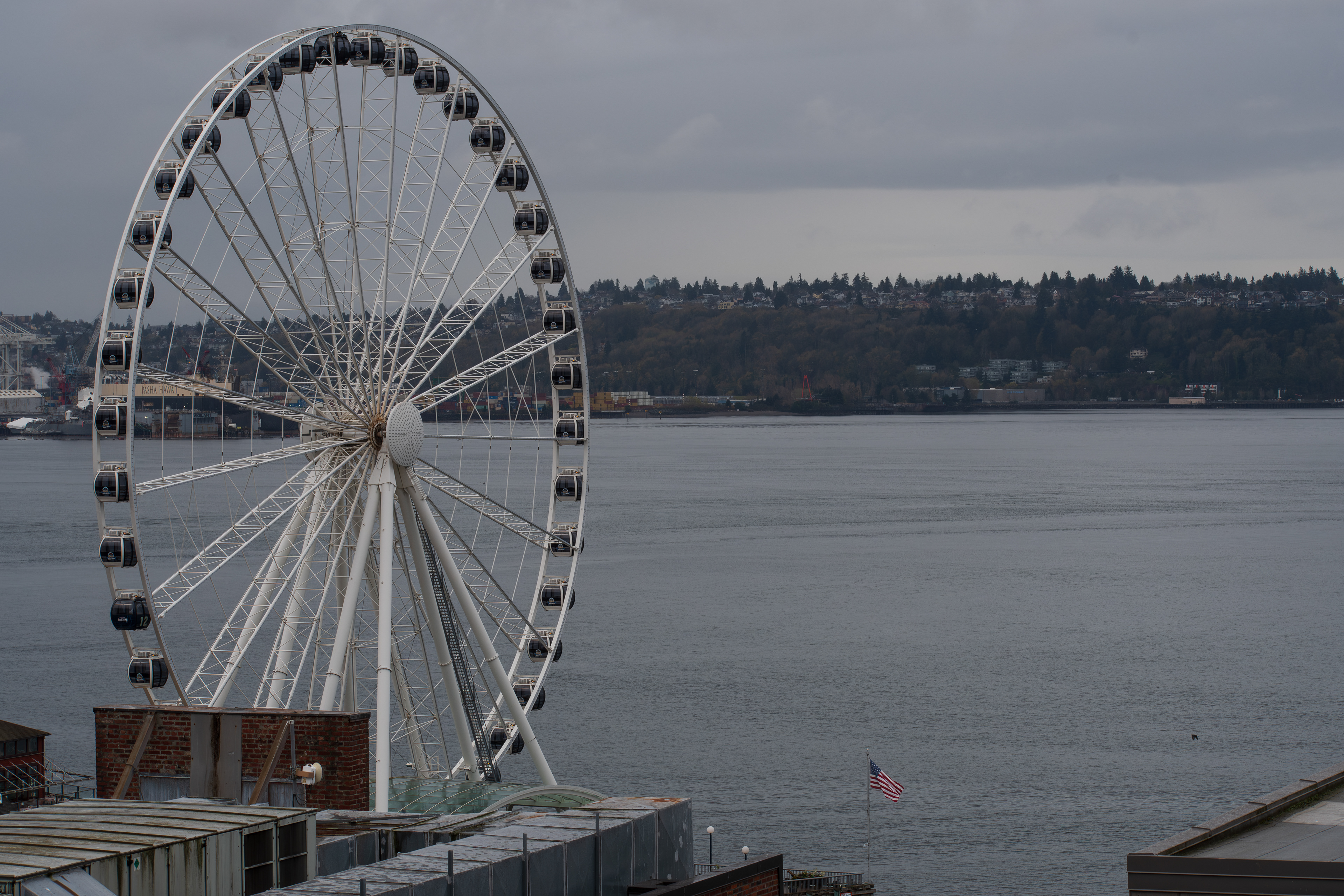 SEATTLE, WA, USA - APR 7, 2025: View of the Seattle Great Wheel on Elliott Bay in Seattle, WA, US. It was constructed starting on April 17, 2012, and officially opened to the public on June 29, 2012.