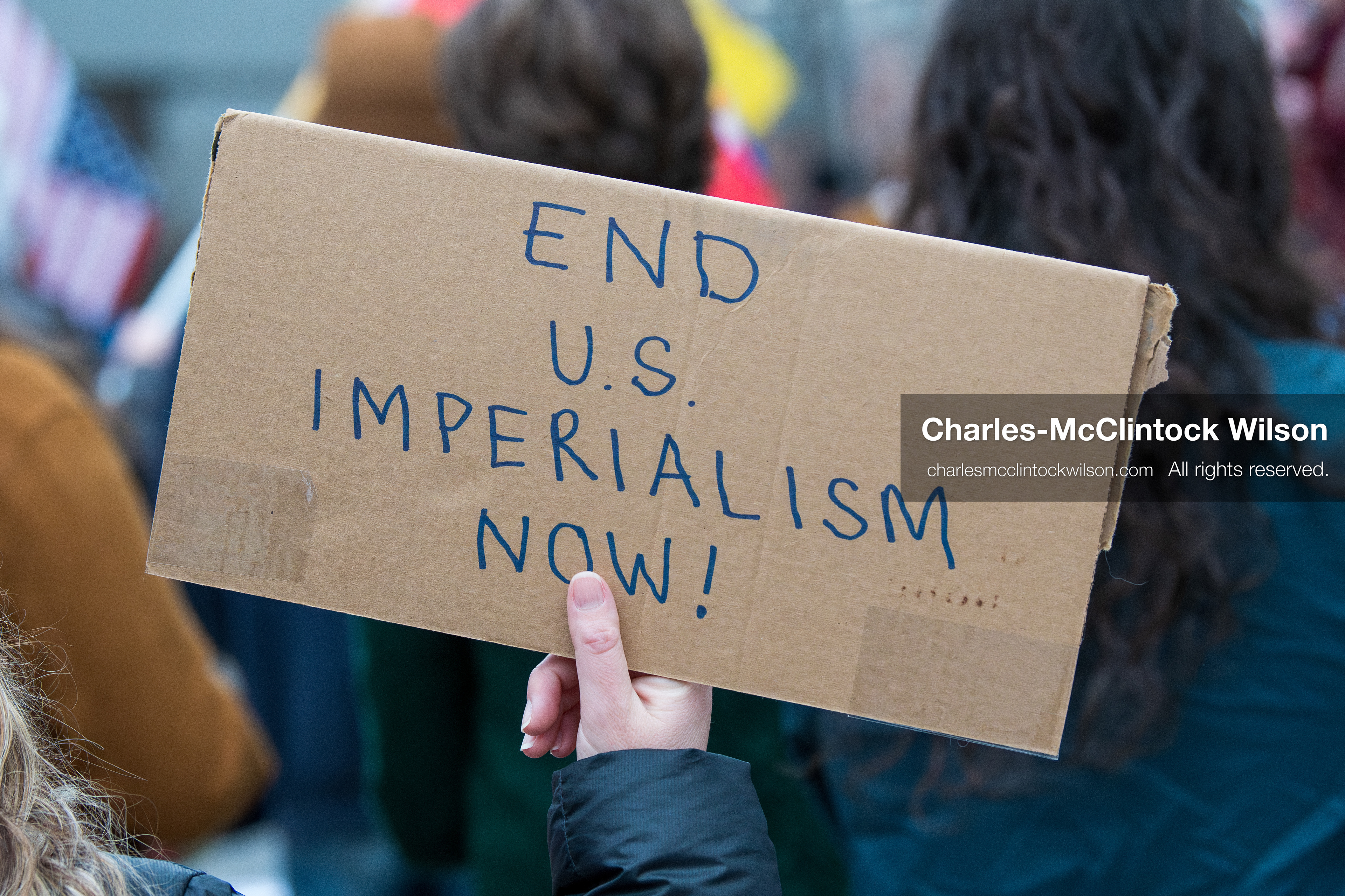 January 3, 2026, Salt Lake City, Utah, USA: A protester holds a sign during a demonstration against US action in Venezuela outside the Wallace Federal Building in Salt Lake City, Utah. The protest was part of a nationwide mobilization responding to recent military developments. (Credit Image: (c) Charles‑McClintock Wilson/ZUMA Press Wire)