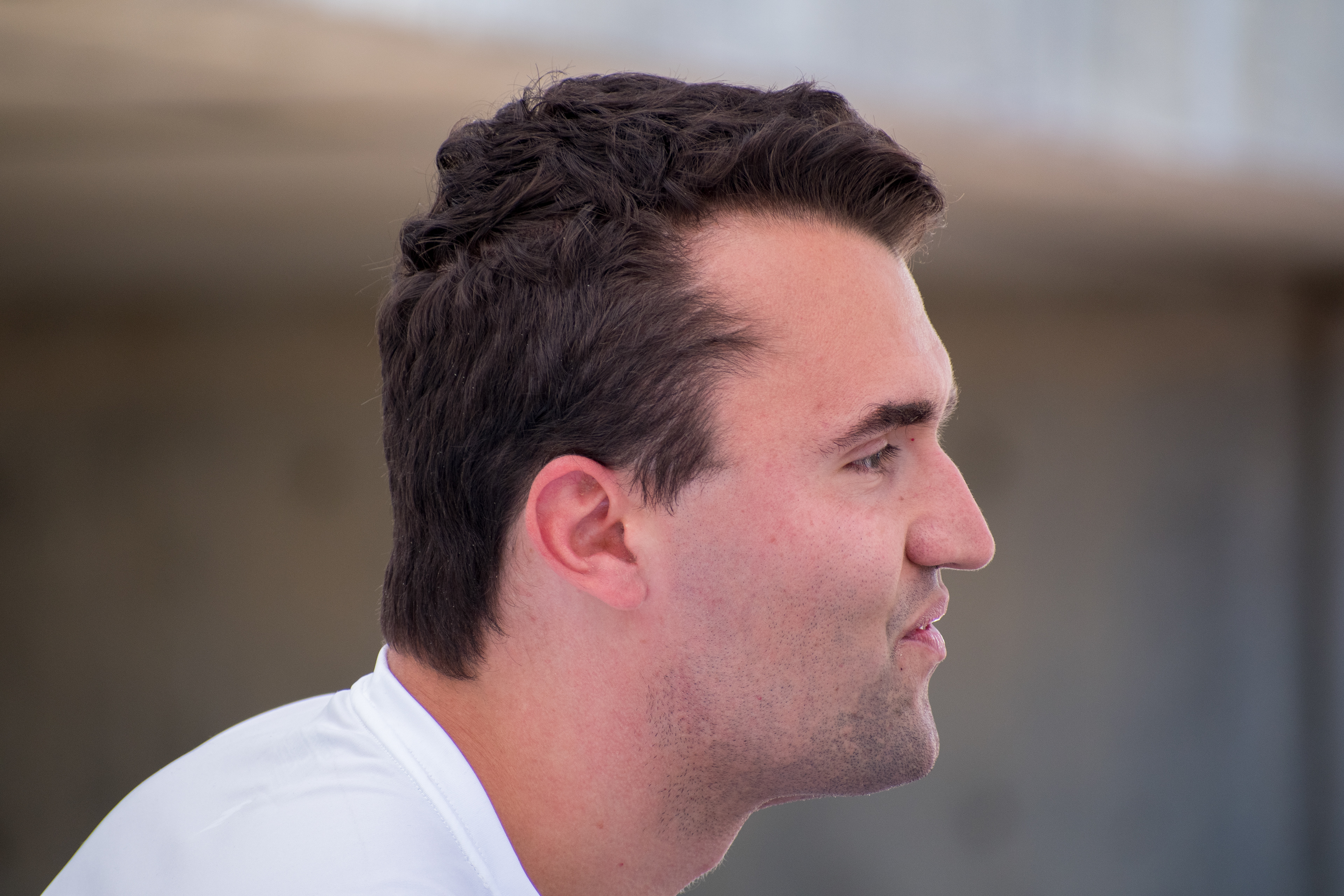 OREM, UTAH – SEPTEMBER 10, 2025: Charlie Kirk appears focused and resolute during a public event at Utah Valley University. Captured in a moment of quiet intensity, Kirk looks off-camera as media lenses track his movements. The image reflects the tension and conviction that defined his final public appearance before the shooting incident that disrupted the event. © Charles-McClintock Wilson / ZUMA Press 