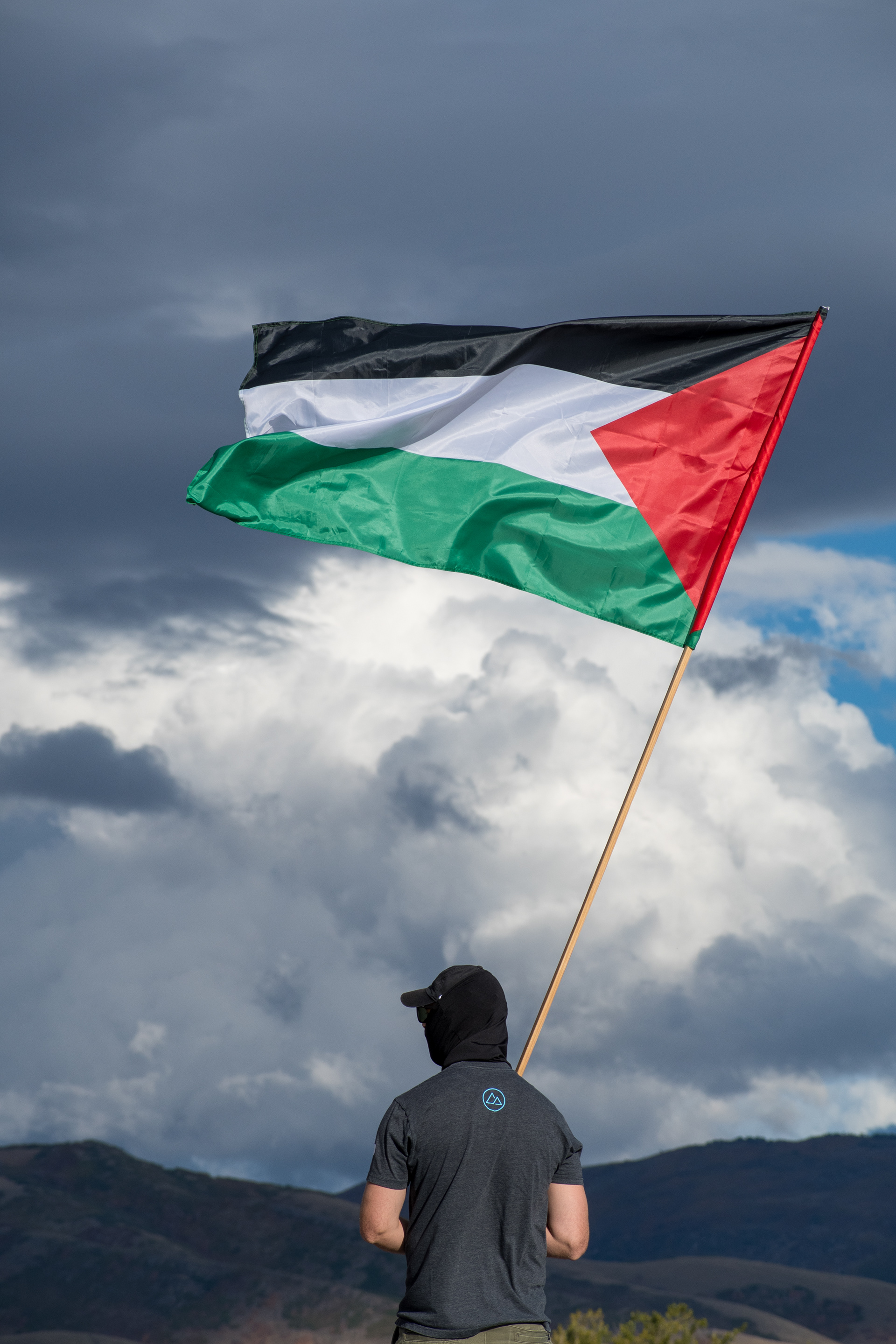 October 10, 2025, Salt Lake City, Utah, USA: A demonstrator stands with a Palestinian flag during the Free Palestine Rally organized in front of the Utah State Capitol. (Credit Image: © Charles-McClintock Wilson/ZUMA Press Wire)