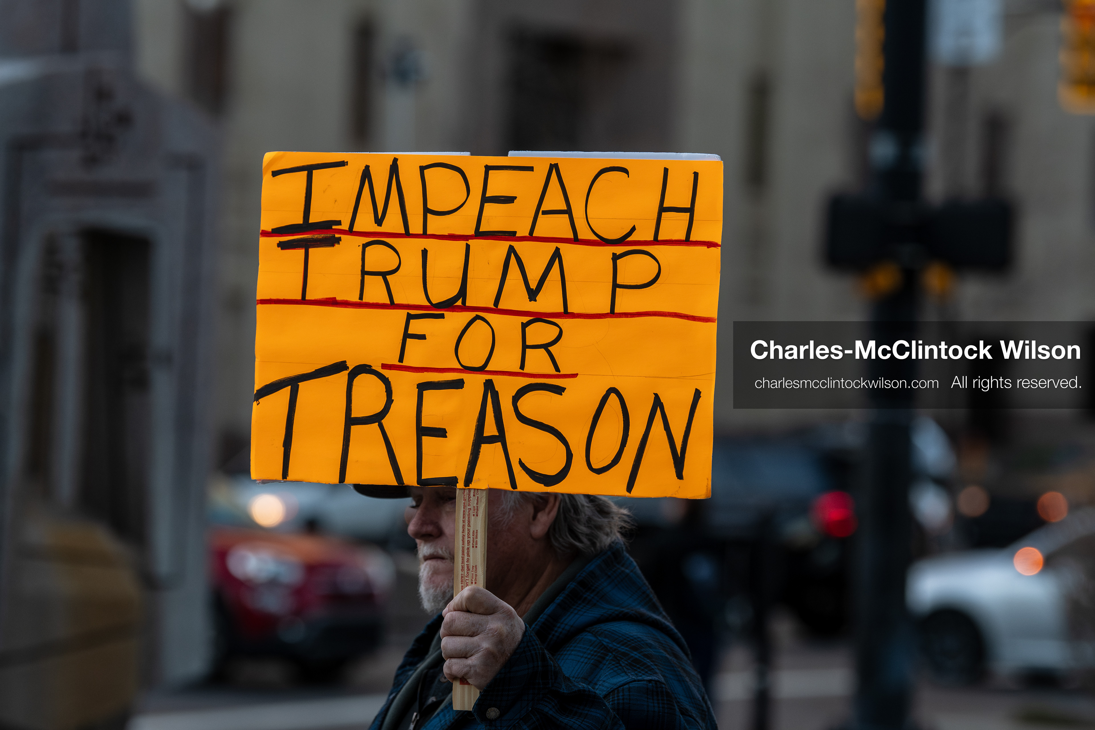 January 5, 2026, Salt Lake City, Utah, USA: A demonstrator holds a sign during a protest outside the Wallace Federal Building in Salt Lake City, Utah. The rally, organized by Salt Lake Indivisible, called for congressional limits on presidential war powers following recent US military actions in Venezuela involving the government of Nicolas Maduro. (Credit Image: (c) Charles‑McClintock Wilson/ZUMA Press Wire)