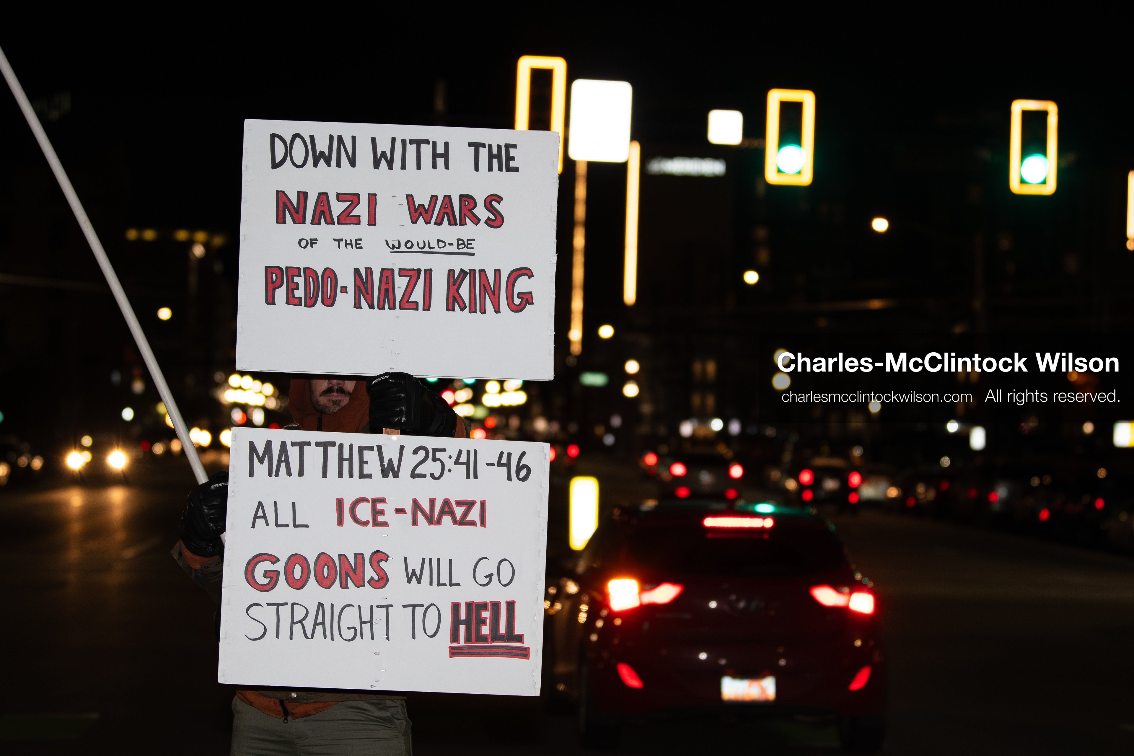 January 8, 2026, Salt Lake City, Utah, USA: A demonstrator holds two signs during an anti ICE protest at Pioneer Park in Salt Lake City Utah on Jan 8 2026. The rally followed the death of Renee Nicole Good a Minneapolis woman who was fatally shot during an encounter with immigration authorities and drew hundreds calling for accountability and changes to enforcement practices. (Credit Image: © Charles-McClintock Wilson/ZUMA Press Wire)