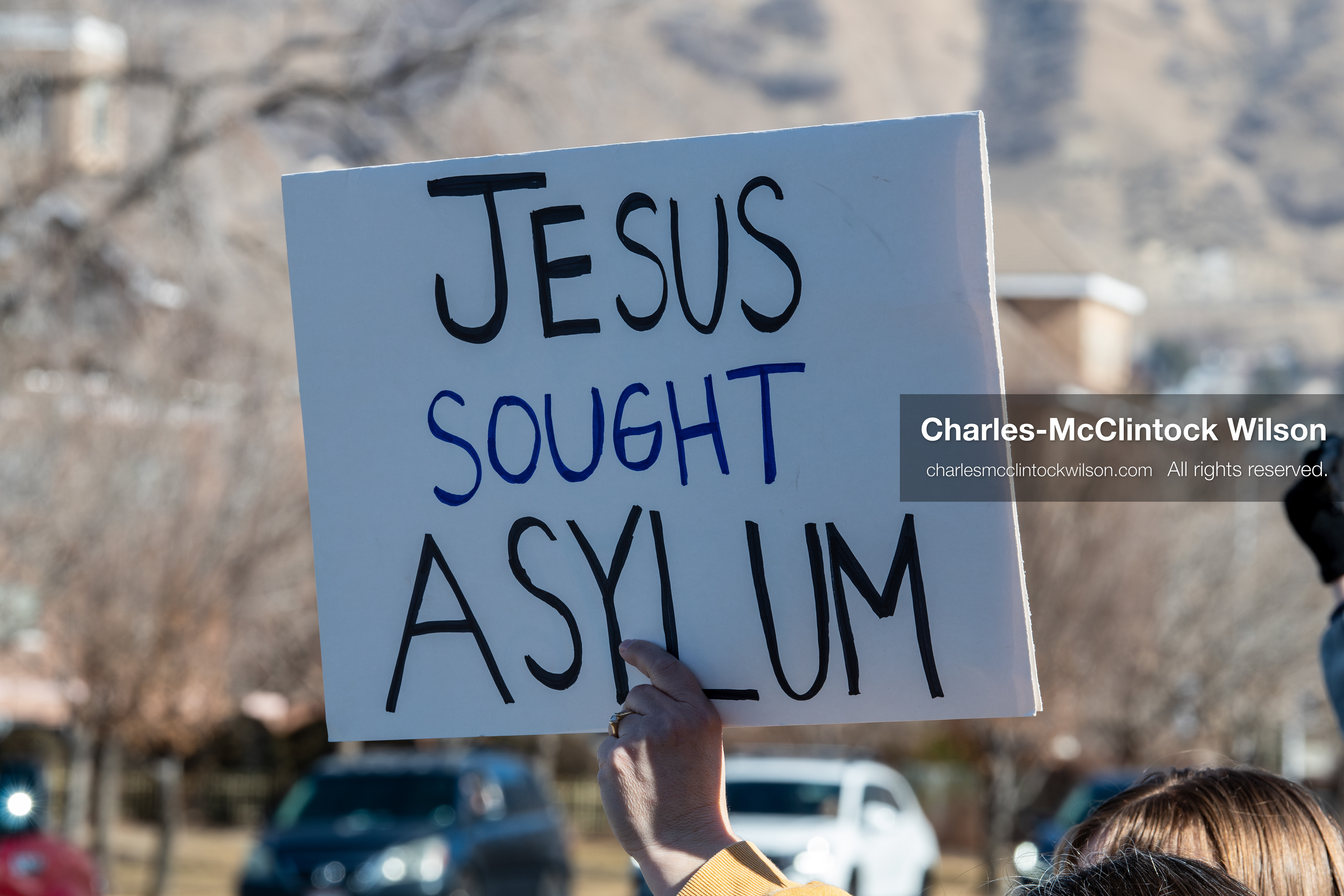 February 5, 2026, Provo, Utah, USA: A demonstrator holds a sign during a gathering near Brigham Young University in Provo where students and community members protested the presence of US Customs and Border Protection recruiters at a career fair held on the BYU campus. (Credit Image: © Charles McClintock Wilson/ZUMA Press Wire)