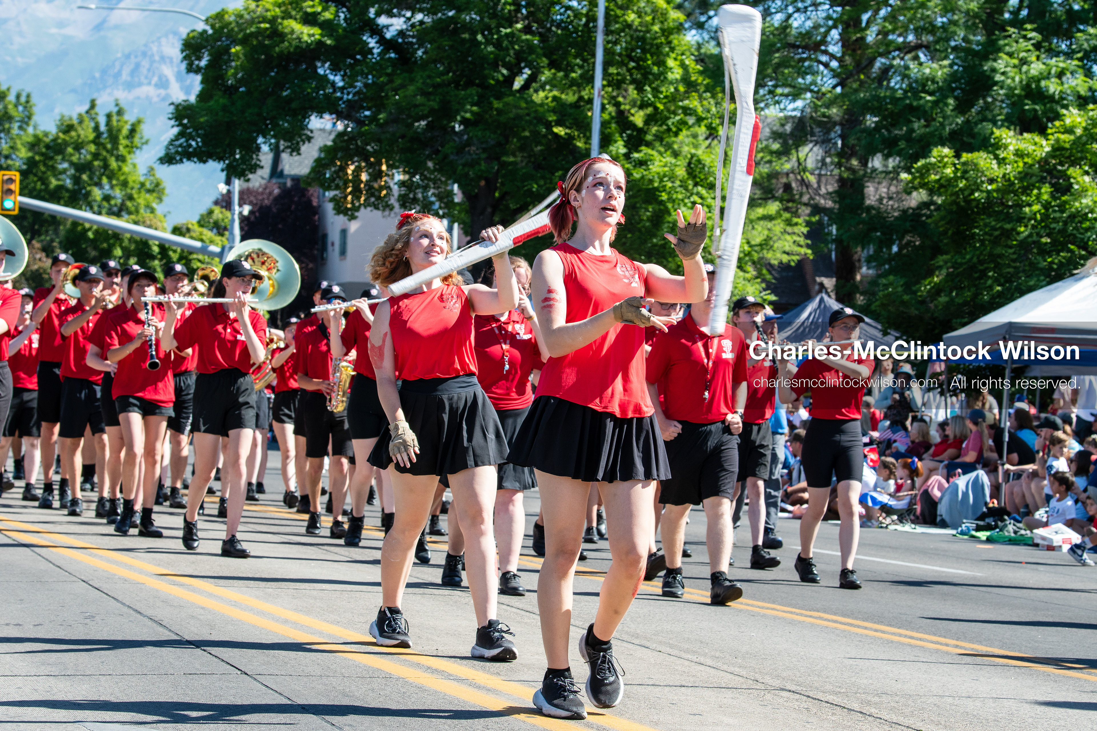 July 4, 2026, Provo, Utah, USA: Members of a high school marching band dressed in maroon and black uniforms play brass instruments while marching down the street during America's Freedom Festival Grand Parade in Provo, Utah, Saturday, July 4, 2026. The annual Independence Day event features expanded programming to honor the 250th anniversary of United States independence. (Credit Image: © Charles-McClintock Wilson/ZUMA Press Wire)