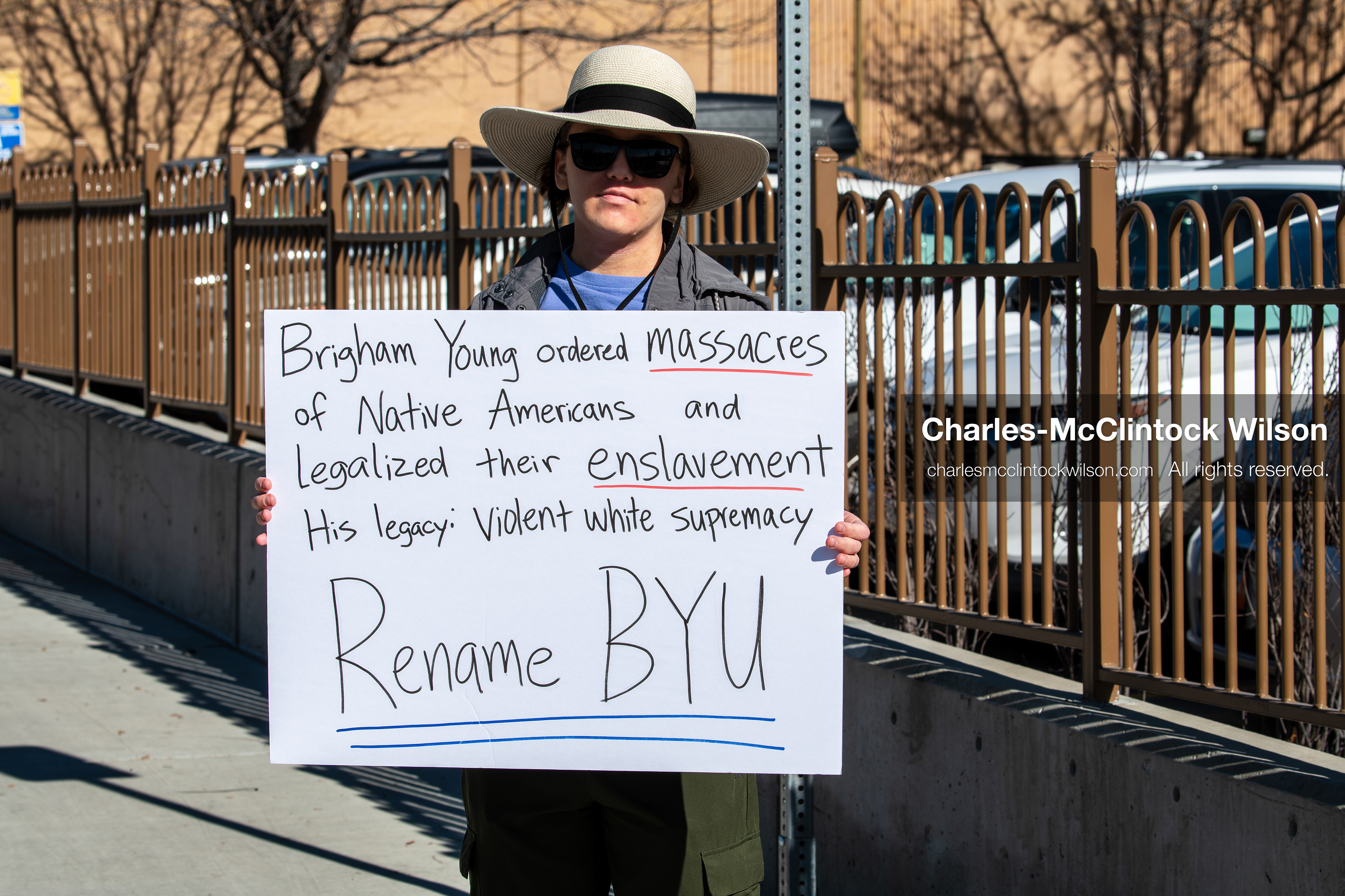 February 5, 2026, Provo, Utah, USA: A demonstrator holds a sign during a gathering near Brigham Young University in Provo where students and community members protested the presence of US Customs and Border Protection recruiters at a career fair held on the BYU campus. (Credit Image: © Charles McClintock Wilson/ZUMA Press Wire)