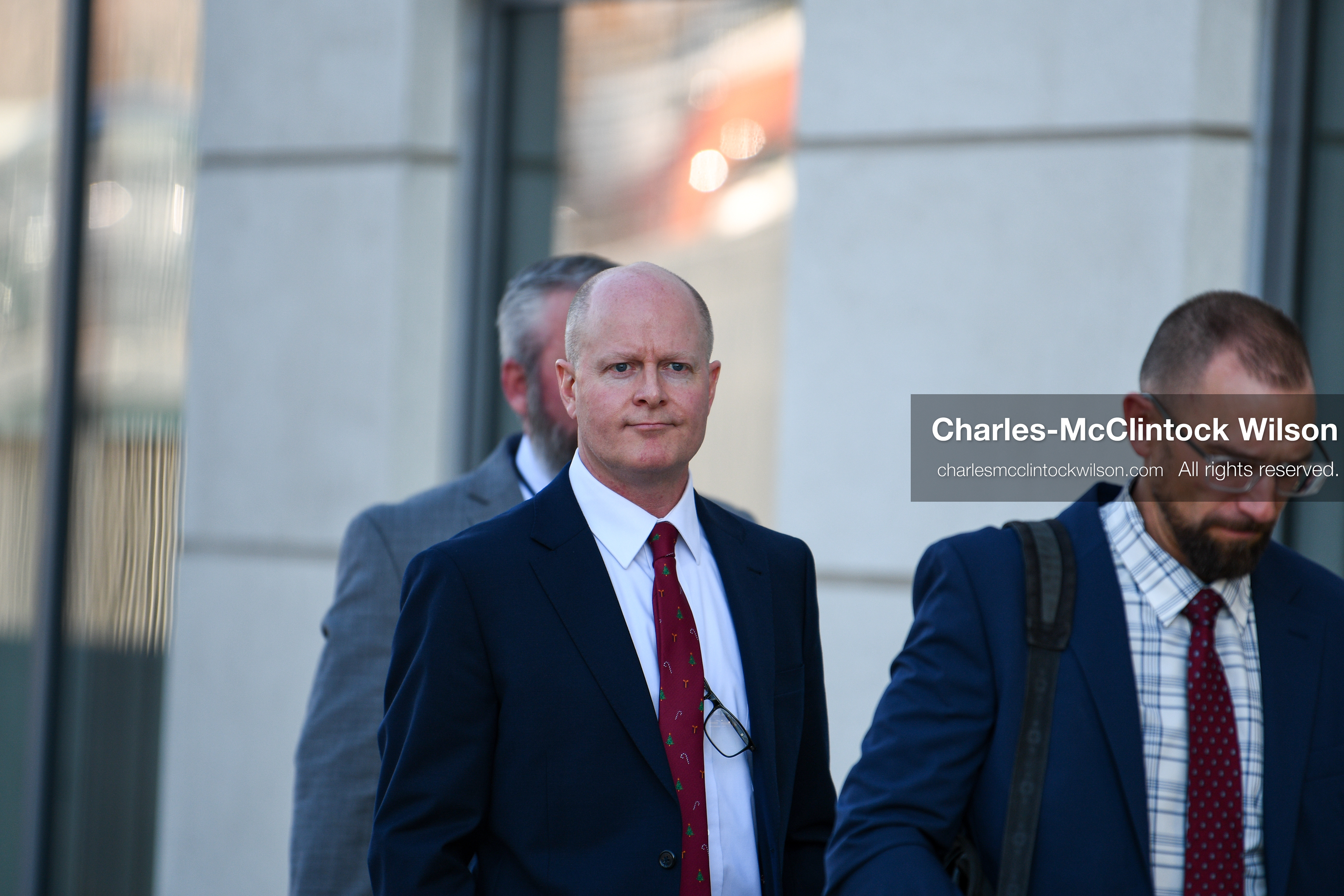 PROVO, UTAH, USA – DECEMBER 11, 2025: Chad Grunander, center, a prosecutor with the Utah County Attorney’s Office, arrives at the Fourth District Court in Provo for the first in‑person court appearance of Tyler Robinson in the Charlie Kirk murder case. (Credit Image: © Charles‑McClintock Wilson/ZUMA Press Wire)