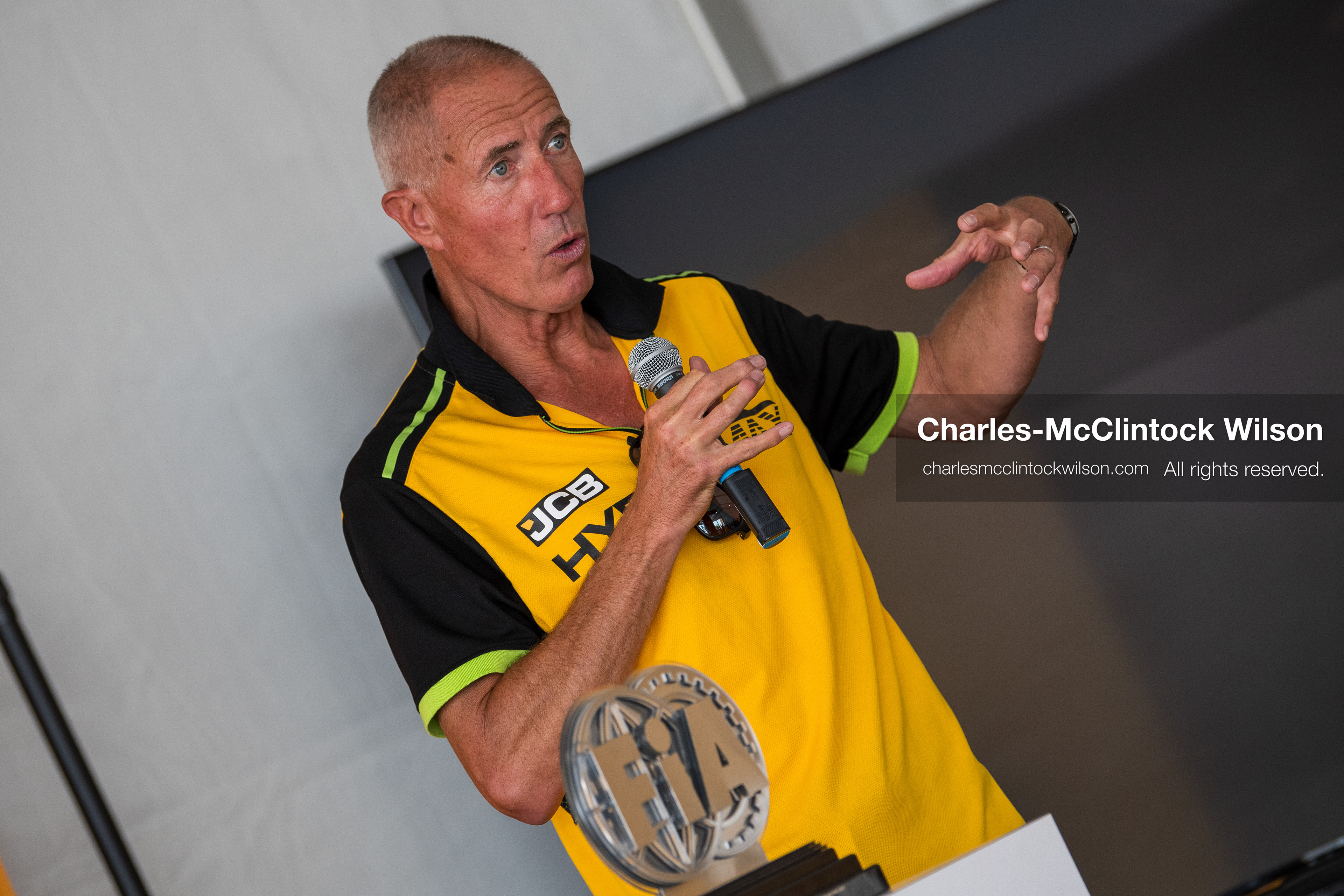  August 11, 2026, Wendover, Utah, USA: British pilot ANDY GREEN speaks into a microphone during a press conference at the Bonneville Salt Flats on Tuesday. Green piloted the hydrogen-powered ''JCB Hydromax'' streamliner to a historic record-breaking top speed of 406.320 mph. (Credit Image: © Charles McClintock Wilson/ZUMA Press Wire)