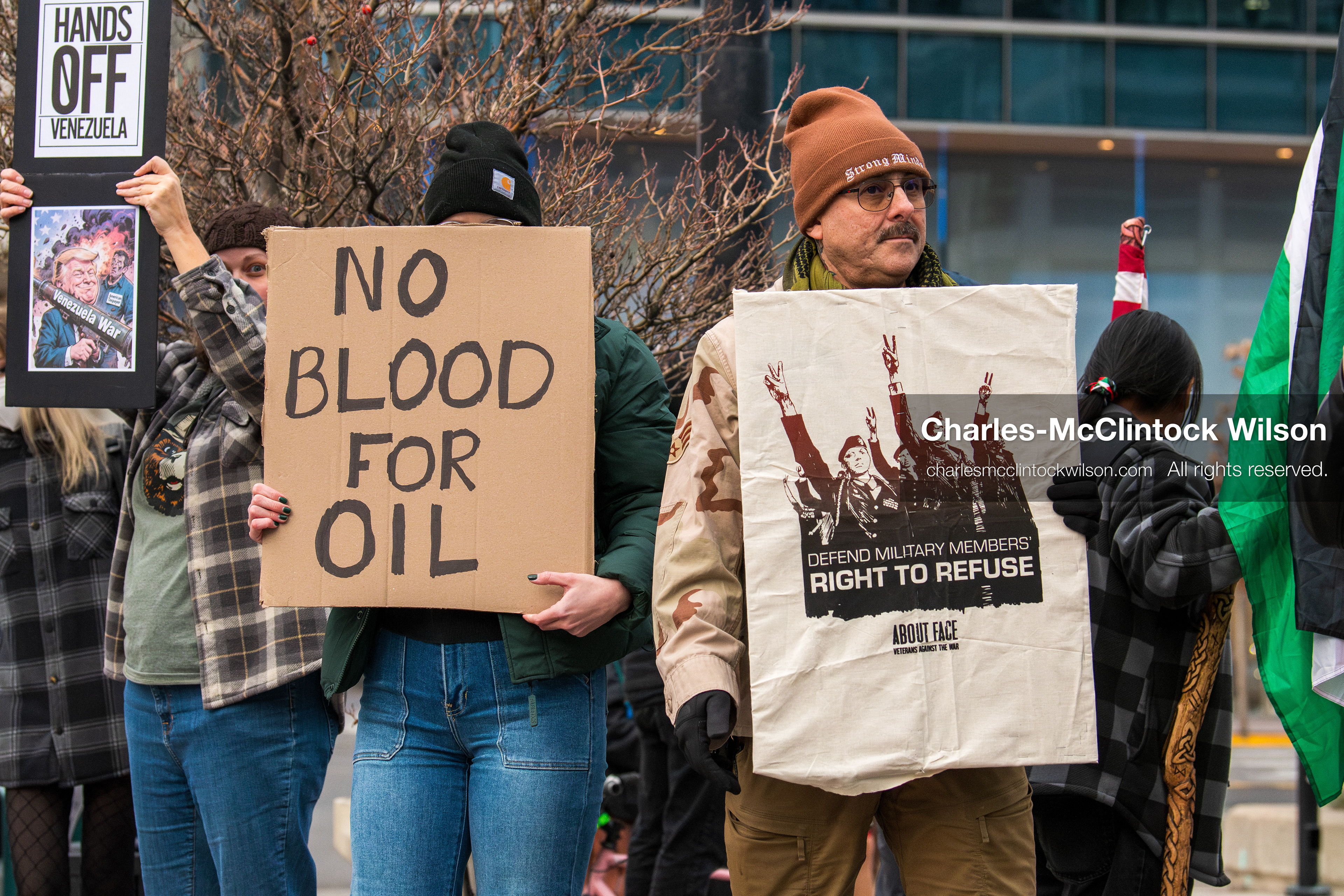 January 3, 2026, Salt Lake City, Utah, USA: Protesters hold signs during an emergency demonstration against US action in Venezuela outside the Wallace Federal Building in Salt Lake City, Utah. The event was part of a nationwide mobilization responding to recent military developments. (Credit Image: (c) Charles‑McClintock Wilson/ZUMA Press Wire)