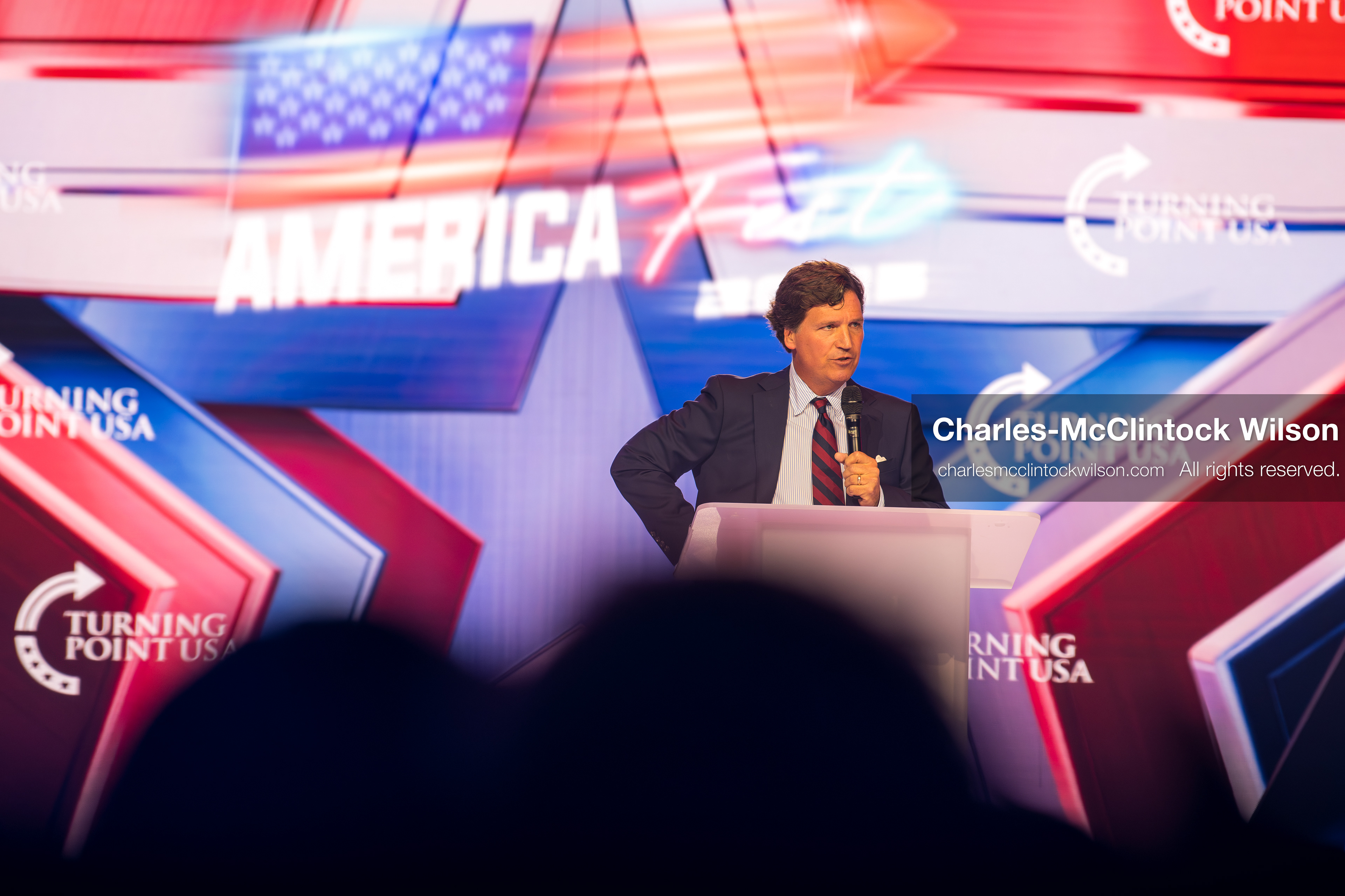 December 18, 2025, Phoenix, Arizona, USA: Tucker Carlson speaks on Day One of Turning Point USA’s AmericaFest 2025 at the Phoenix Convention Center in Phoenix, Arizona.   (Credit Image: © Charles‑McClintock Wilson/ZUMA Press Wire)