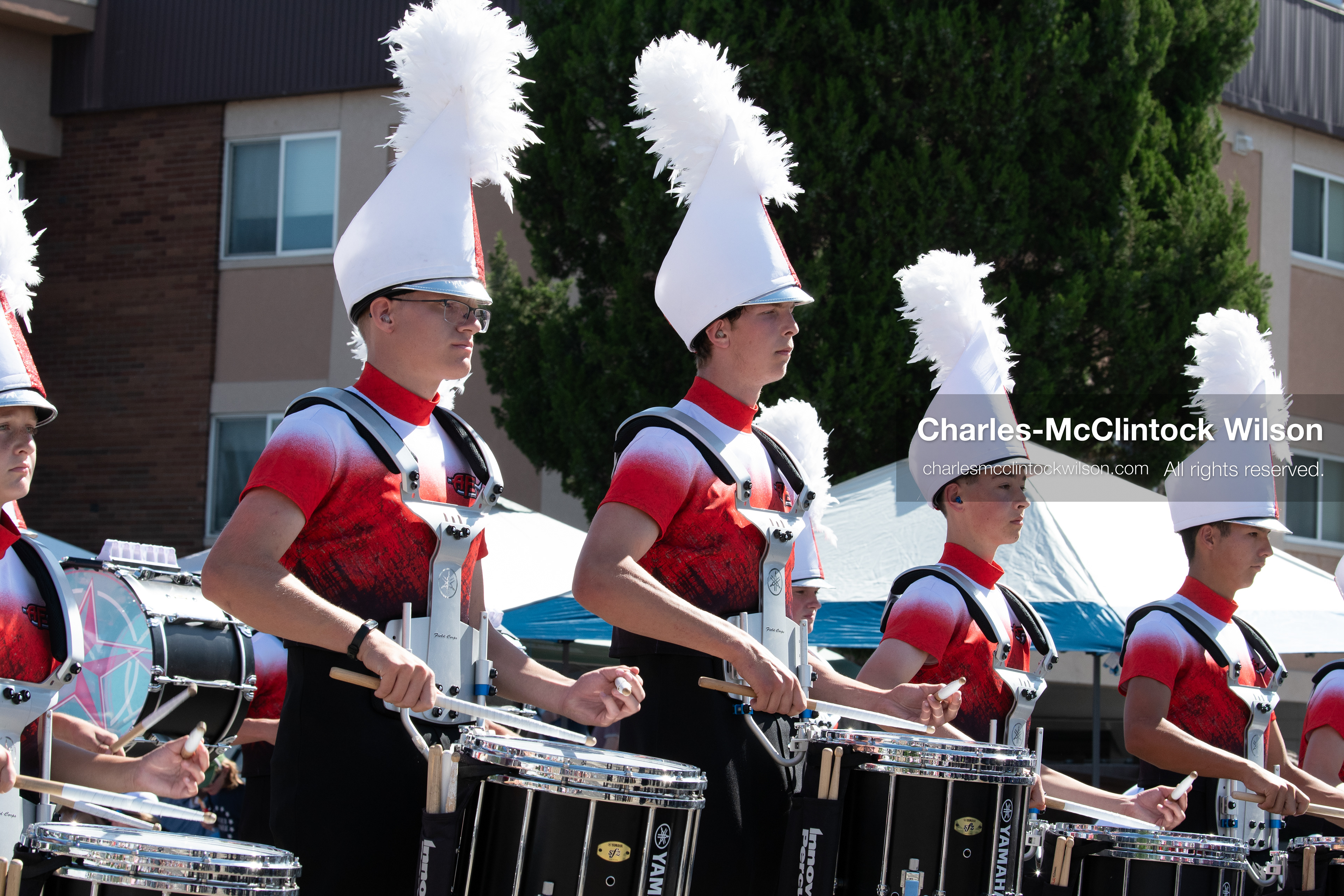 July 4, 2026, Provo, Utah, USA: Members of a high school marching band dressed in maroon and black uniforms play brass instruments while marching down the street during America's Freedom Festival Grand Parade in Provo, Utah, Saturday, July 4, 2026. The annual Independence Day event features expanded programming to honor the 250th anniversary of United States independence. (Credit Image: © Charles-McClintock Wilson/ZUMA Press Wire)