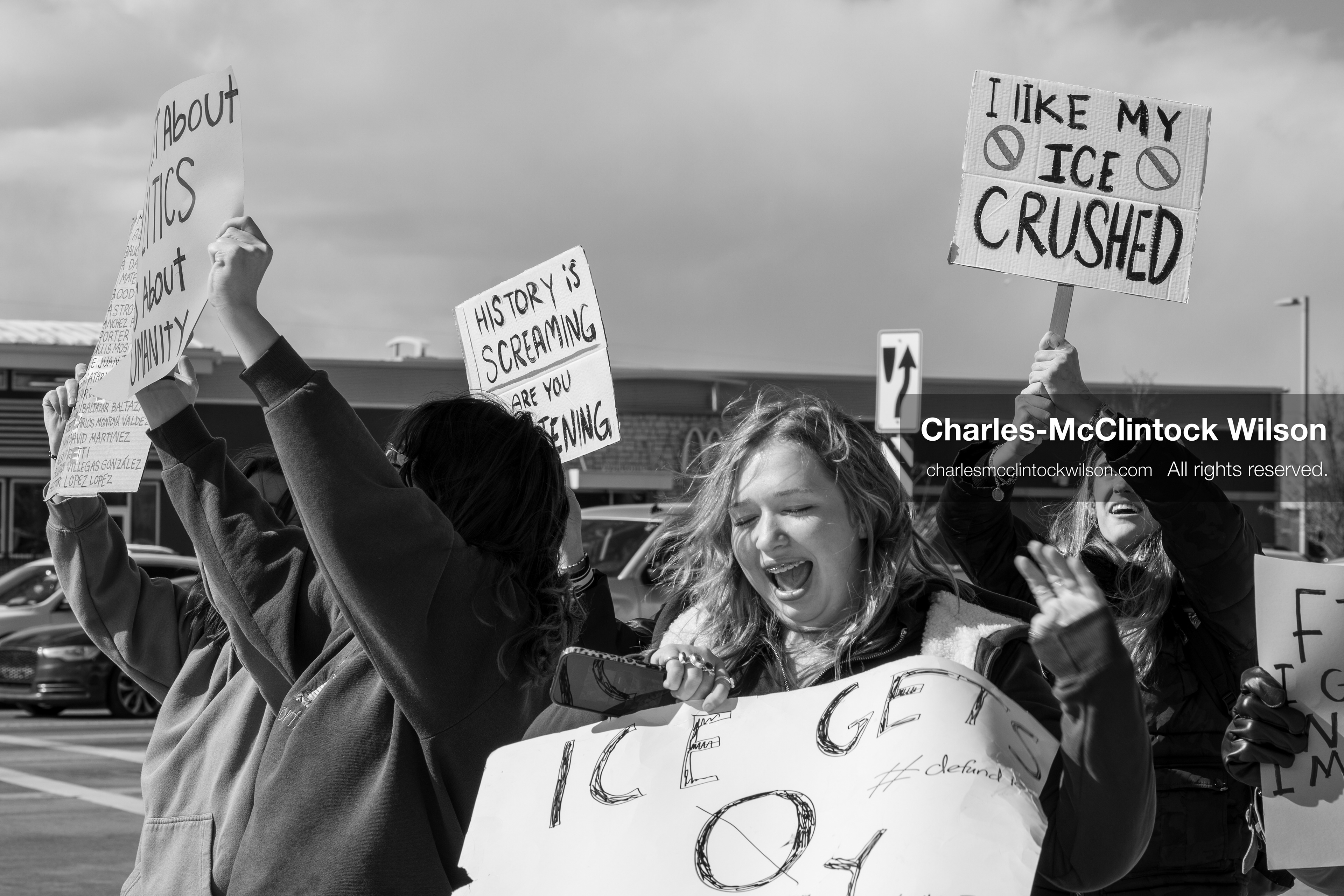 February 20, 2026, Orem, Utah, USA: High school students gather along State Street in front of Orem City Hall during a student led protest against ICE and federal immigration enforcement. Demonstrators hold signs as they stand near the roadway while traffic continues through the area. (Credit Image: © Charles McClintock Wilson/ZUMA Press Wire)