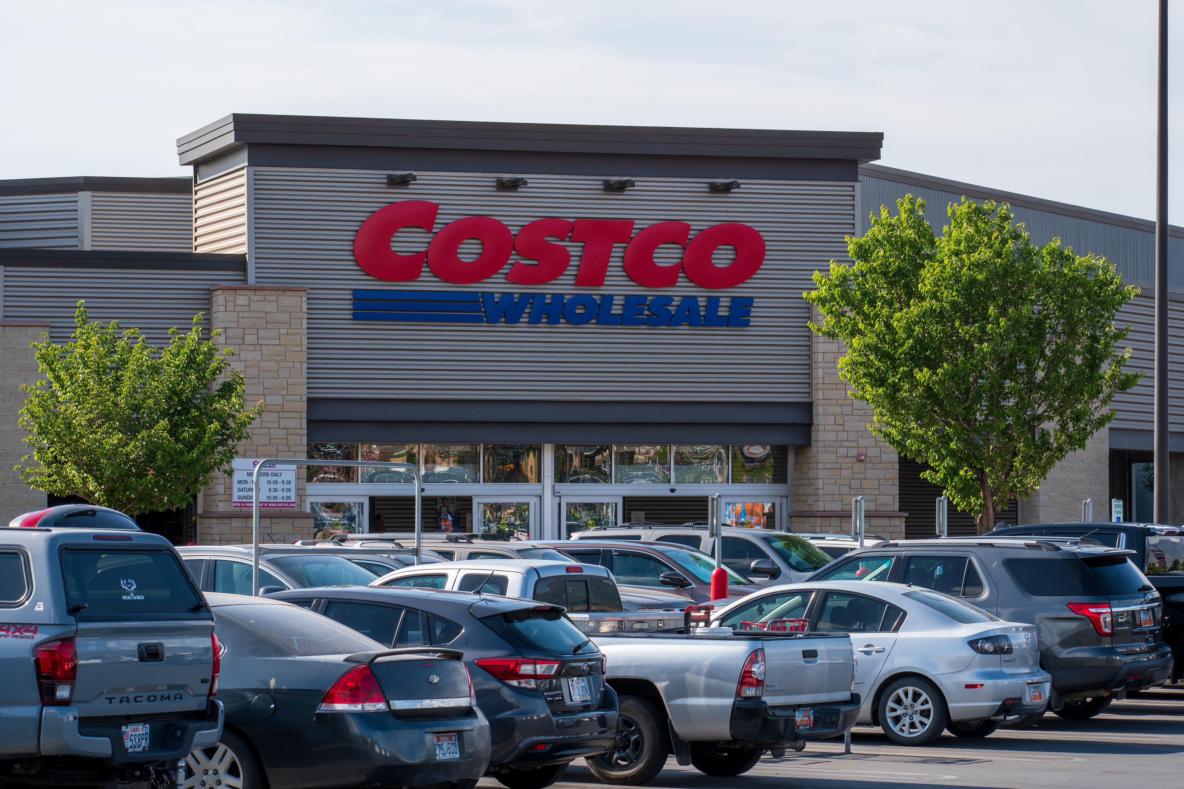 SPANISH FORK, UT – JUNE 8, 2025: Exterior view of a Costco Wholesale retail warehouse with the company’s trademark logo. Costco was founded on September 15, 1983, in Seattle, Washington, USA.