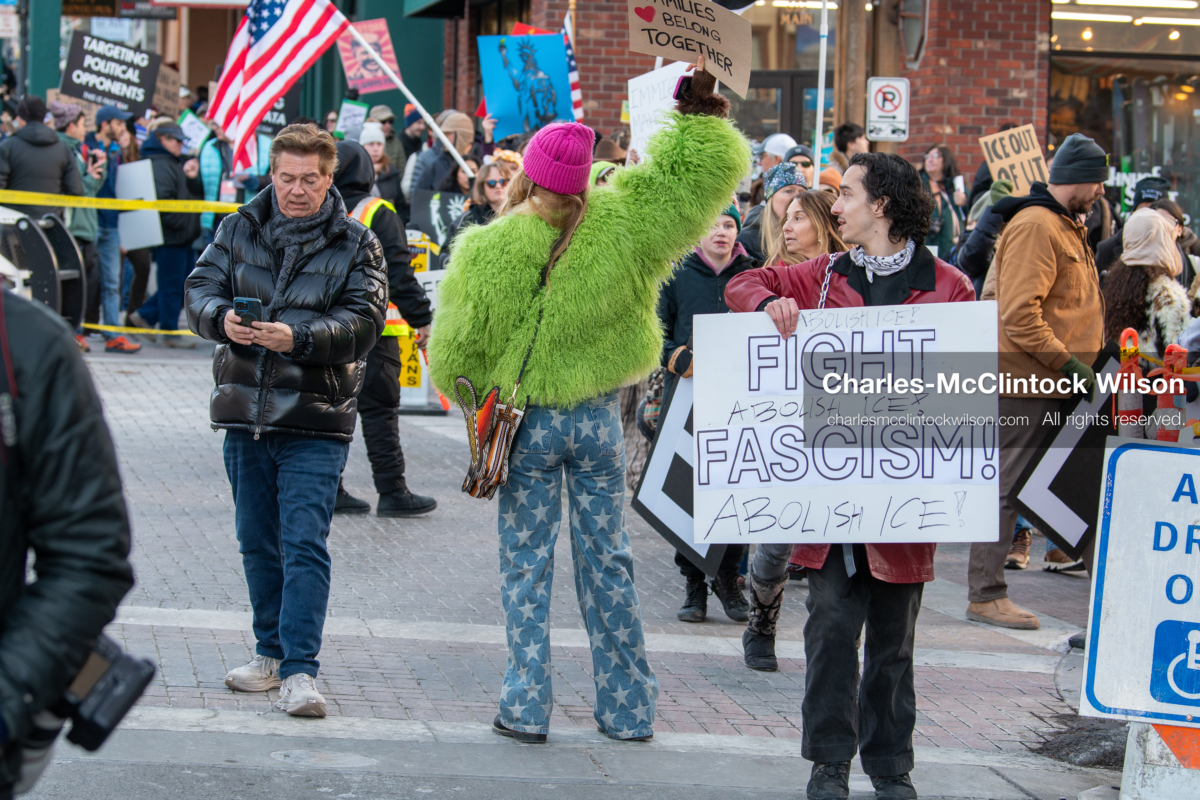 January 26, 2026, Park City, Utah, USA: Demonstrators march through Main Street holding signs during a protest opposing U.S. Immigration and Customs Enforcement (I.C.E.) ICE agents at the Sundance Film Festival in Park City, Utah, on Monday, Jan. 26, 2026. The event was held in response to the fatal shooting of Alex Pretti by a U.S. Border Patrol officer in Minneapolis. (Credit Image: © Charles McClintock Wilson/ZUMA Press Wire)