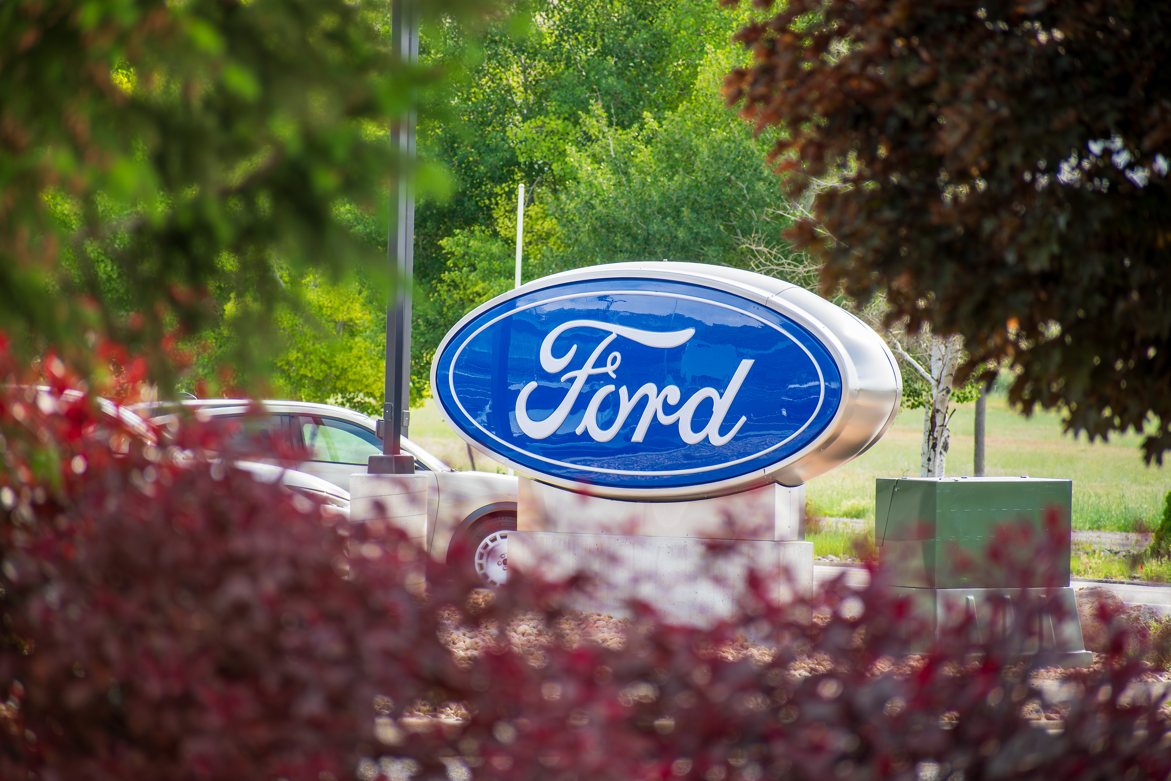 Spanish Fork, Utah, US – May 28, 2025: Signage outside a Ford dealership in Spanish Fork highlights the brand amid Ford’s recall of over 1 million U.S. vehicles due to faulty rearview camera software.