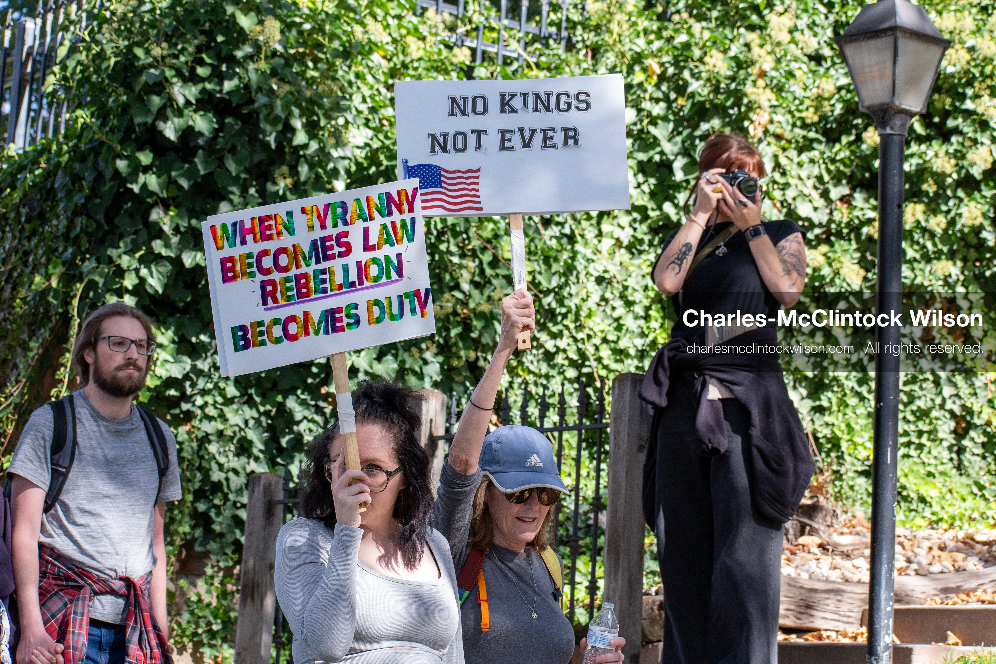 October 18, 2025, Salt Lake City, Utah, USA: Demonstrators march along South State Street during a "No Kings" protest in Salt Lake City, Utah. The protest was part of a nationwide mobilization.