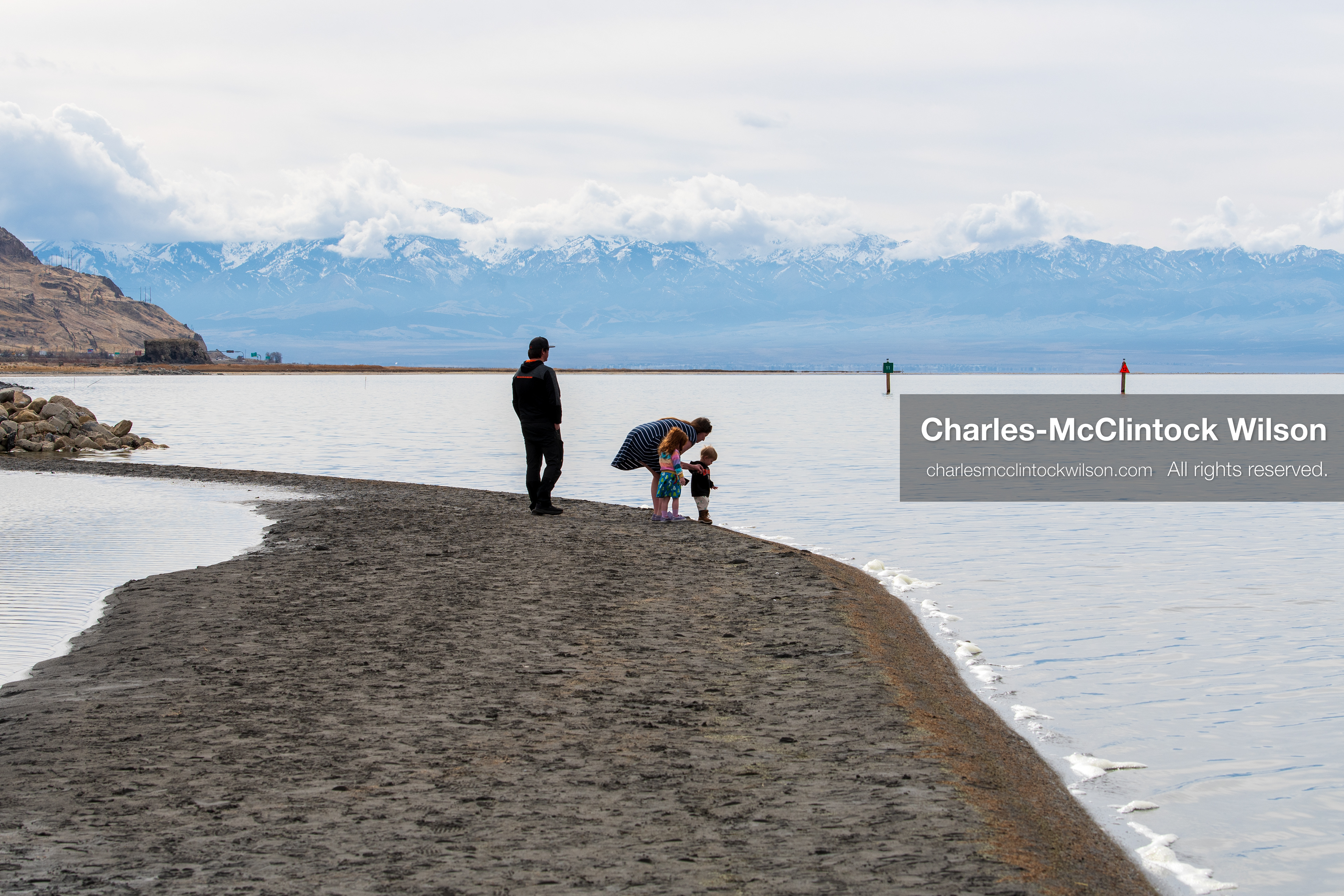March 1, 2026, Great Salt Lake, Utah, USA: People walk along the shoreline of the Great Salt Lake as water levels remain historically low. Reports from state officials and the Great Salt Lake Strike Team state that the lake continues to fall within a serious adverse‑effects range, with elevations among the lowest recorded in more than one hundred years. The lake has drawn increased public attention as lawmakers consider large‑scale water projects and long‑term plans to address declining conditions. (Credit Image: © Charles‑McClintock Wilson/ZUMA Press Wire)