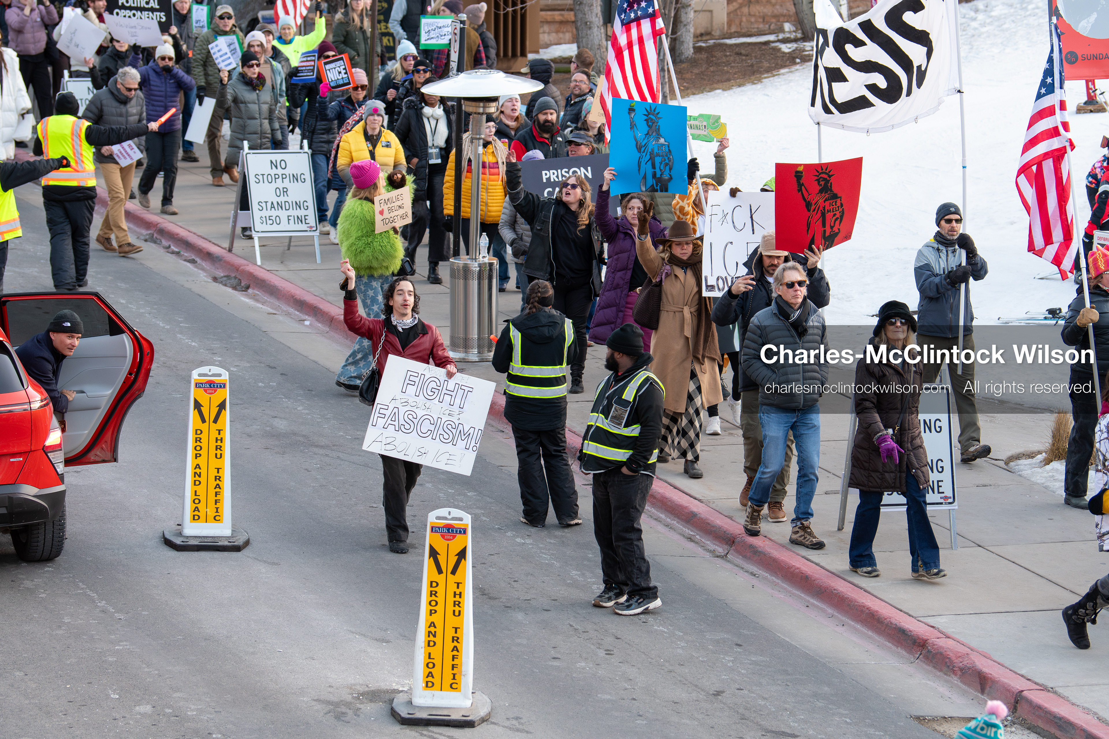 January 26, 2026, Park City, Utah, USA: Demonstrators march through Main Street holding signs during a protest opposing U.S. Immigration and Customs Enforcement (I.C.E.) ICE agents at the Sundance Film Festival in Park City, Utah, on Monday, Jan. 26, 2026. The event was held in response to the fatal shooting of Alex Pretti by a U.S. Border Patrol officer in Minneapolis. (Credit Image: © Charles McClintock Wilson/ZUMA Press Wire)