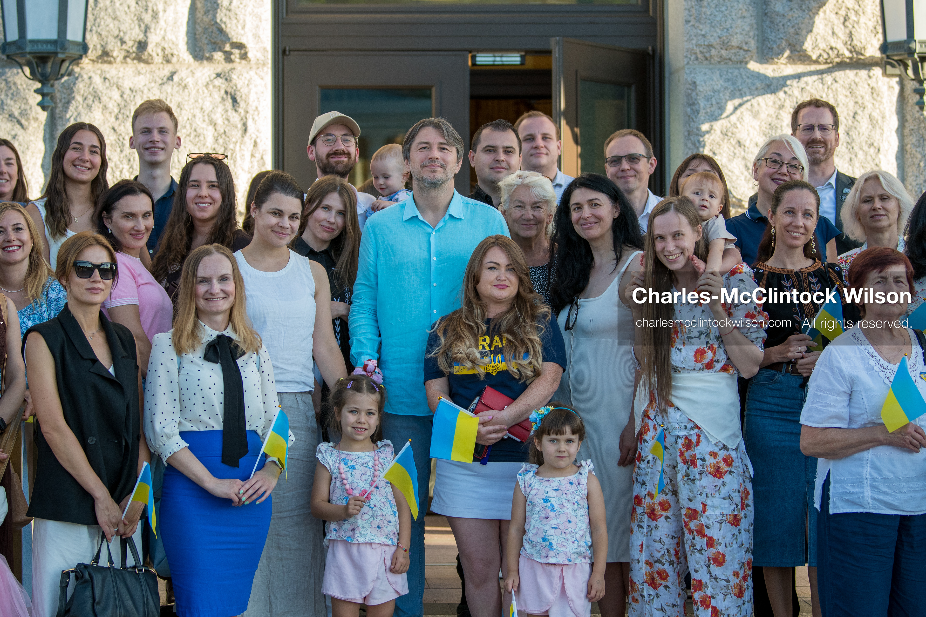 July 23, 2026, Salt Lake City, Utah, USA: Ukrainian activist SERHIY PRYTULA holds a small doll while posing for a group photograph with supporters during a community meeting at the Utah State Capitol building in Salt Lake City, Utah, on Thursday, July 23, 2026. The event, titled ''Ukraine in the Fifth Year of the Full-Scale War: An Honest Conversation,'' was hosted by the Prytula Foundation USA to discuss civil defense and ongoing humanitarian aid initiatives. (Credit Image: © Charles-McClintock Wilson/ZUMA Press Wire)