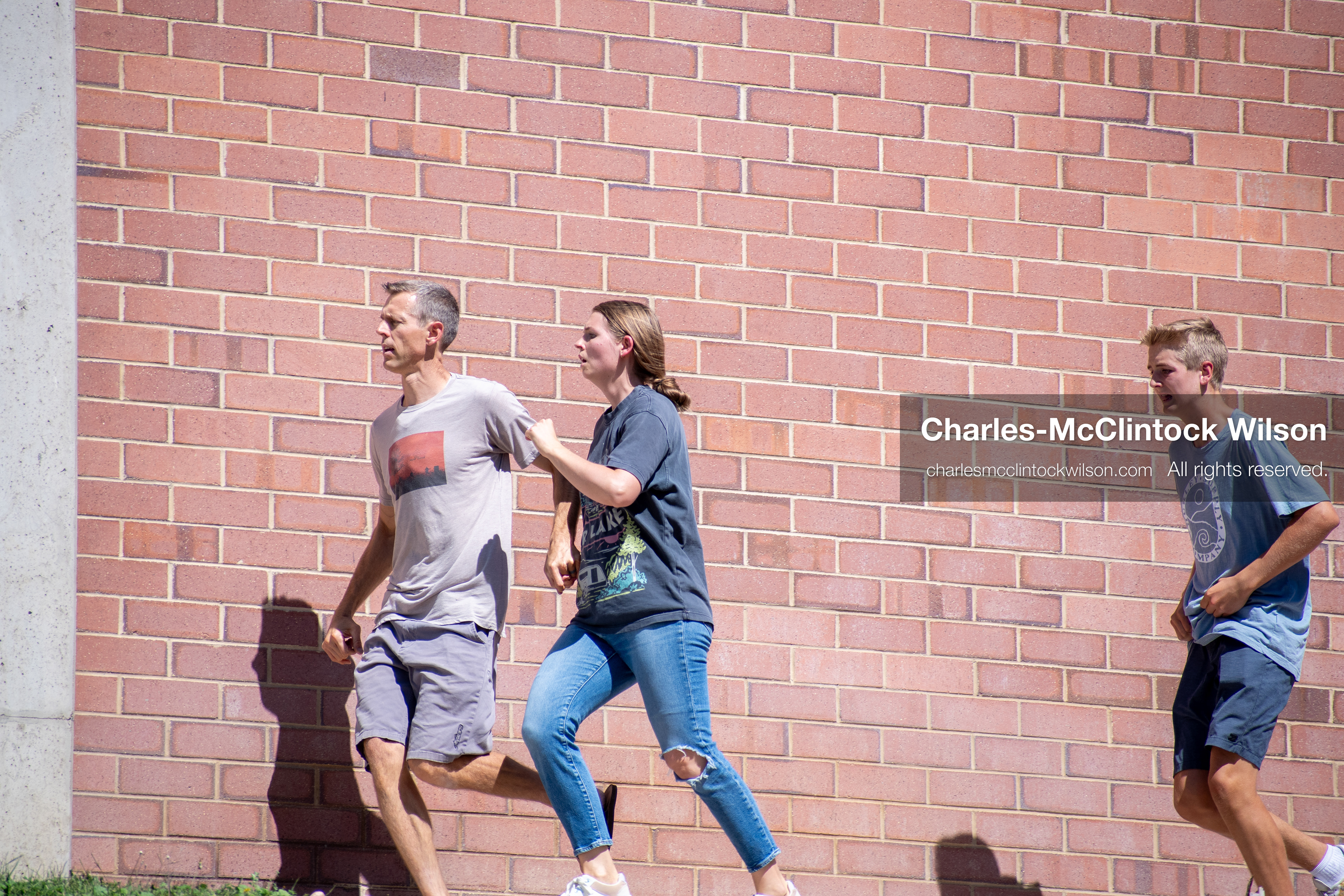 September 10, 2025, Orem, Utah, USA: Attendees flee the scene moments after conservative activist Charlie Kirk is shot during a public event at Utah Valley University. The shooting occurs during a Q&A session with students, approximately two minutes into the exchange. Kirk appears to be struck in the neck. The campus is evacuated as emergency protocols are activated. A university spokesperson states that no suspect is in custody at the time, though an earlier campus alert indicated that police had detained an individual. (Credit Image: © Charles-McClintock Wilson/ZUMA Press Wire)