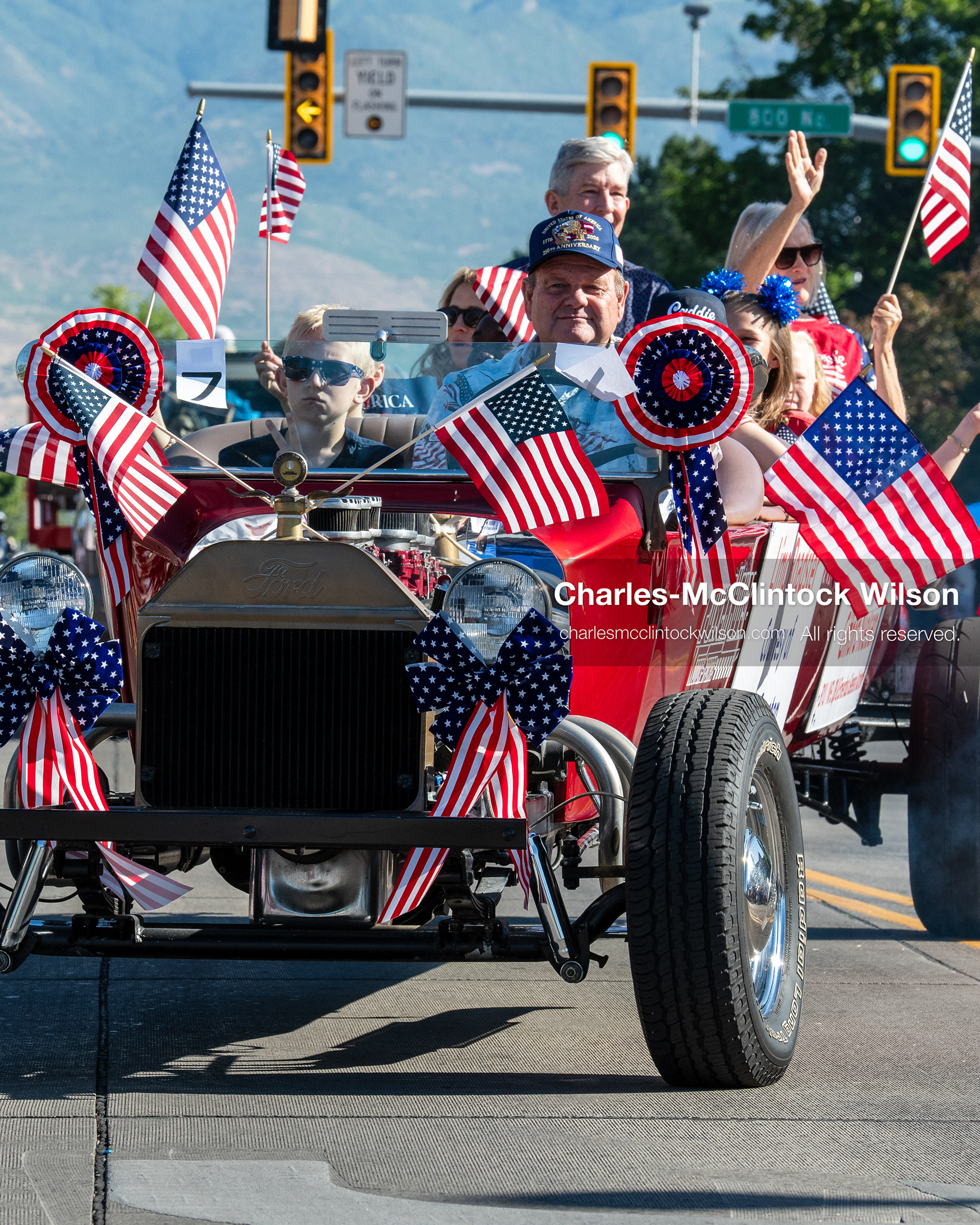 July 4, 2026, Provo, Utah, USA: A custom open-wheel vehicle decorated with American flags drives along the route during America's Freedom Festival Grand Parade in Provo, Utah, Saturday, July 4, 2026. The annual event drew thousands of spectators to the downtown corridor. (Credit Image: © Charles-McClintock Wilson/ZUMA Press Wire)