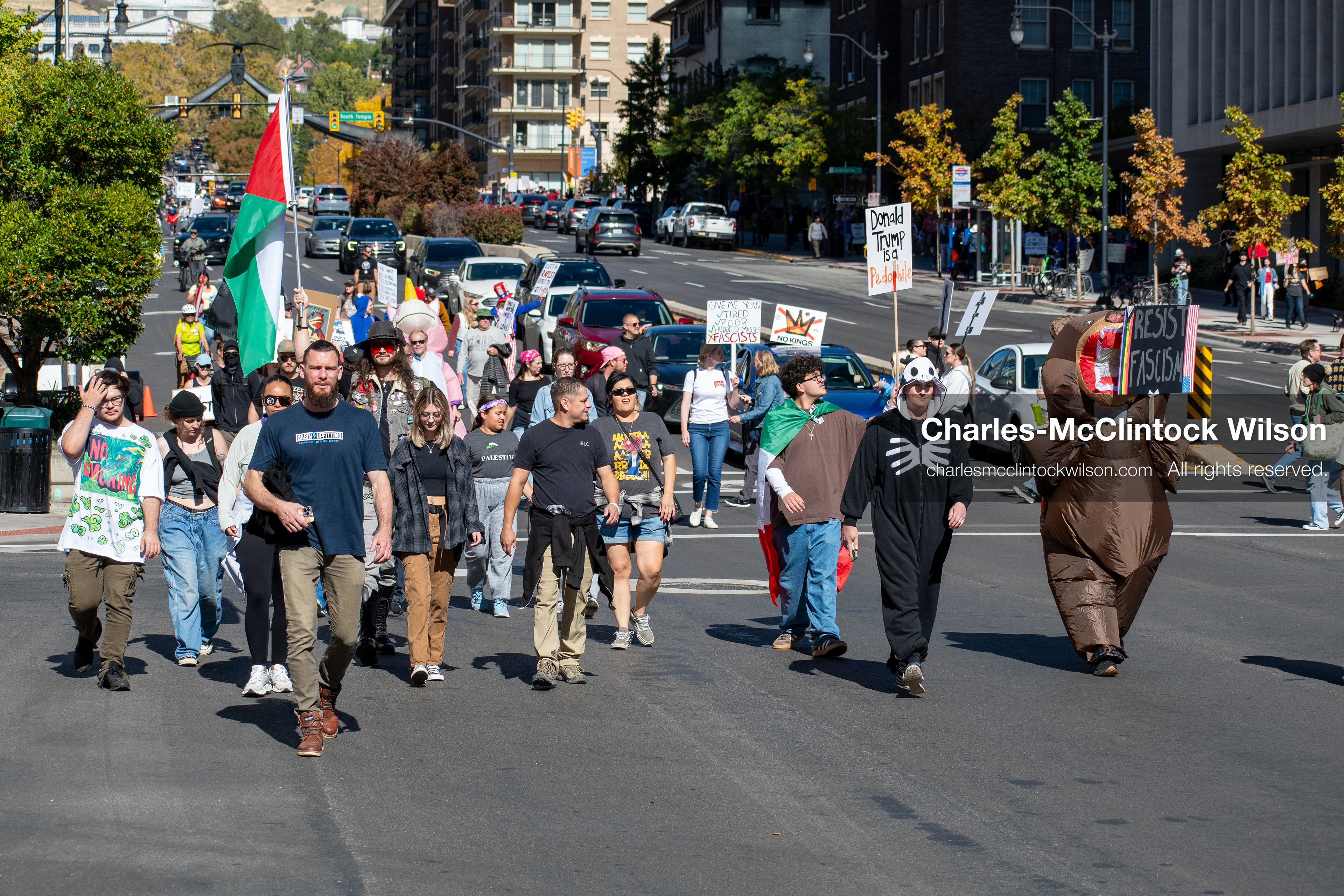 October 18, 2025, Salt Lake City, Utah, USA: Demonstrators march along South State Street during a "No Kings" protest in Salt Lake City, Utah. The protest was part of a nationwide mobilization.