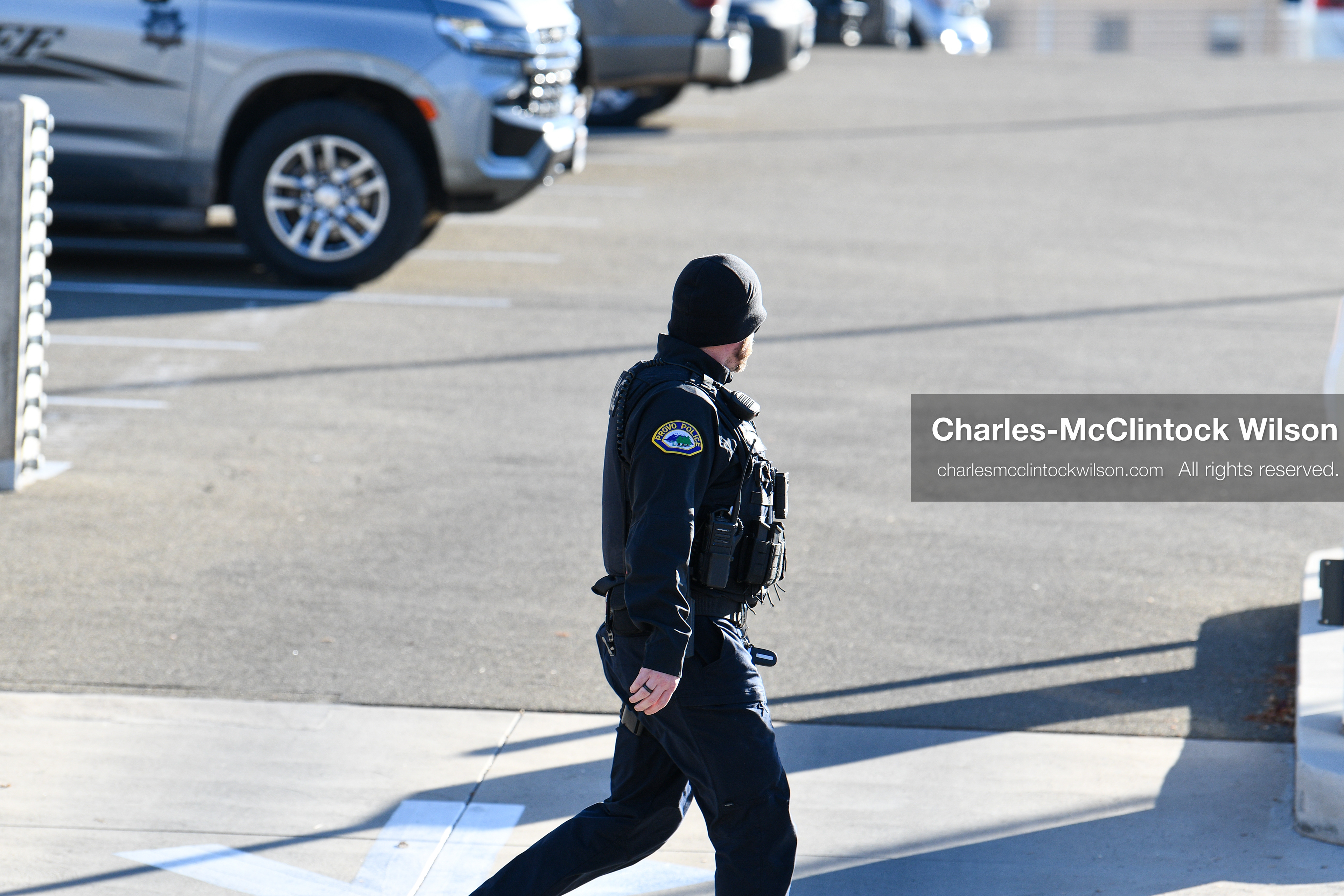 PROVO, UTAH, USA – DECEMBER 11, 2025: A Provo Police officer patrols on foot near the Fourth District Court in Provo during the first in‑person court appearance of Tyler Robinson in the Charlie Kirk murder case. (Credit Image: © Charles‑McClintock Wilson/ZUMA Press Wire)