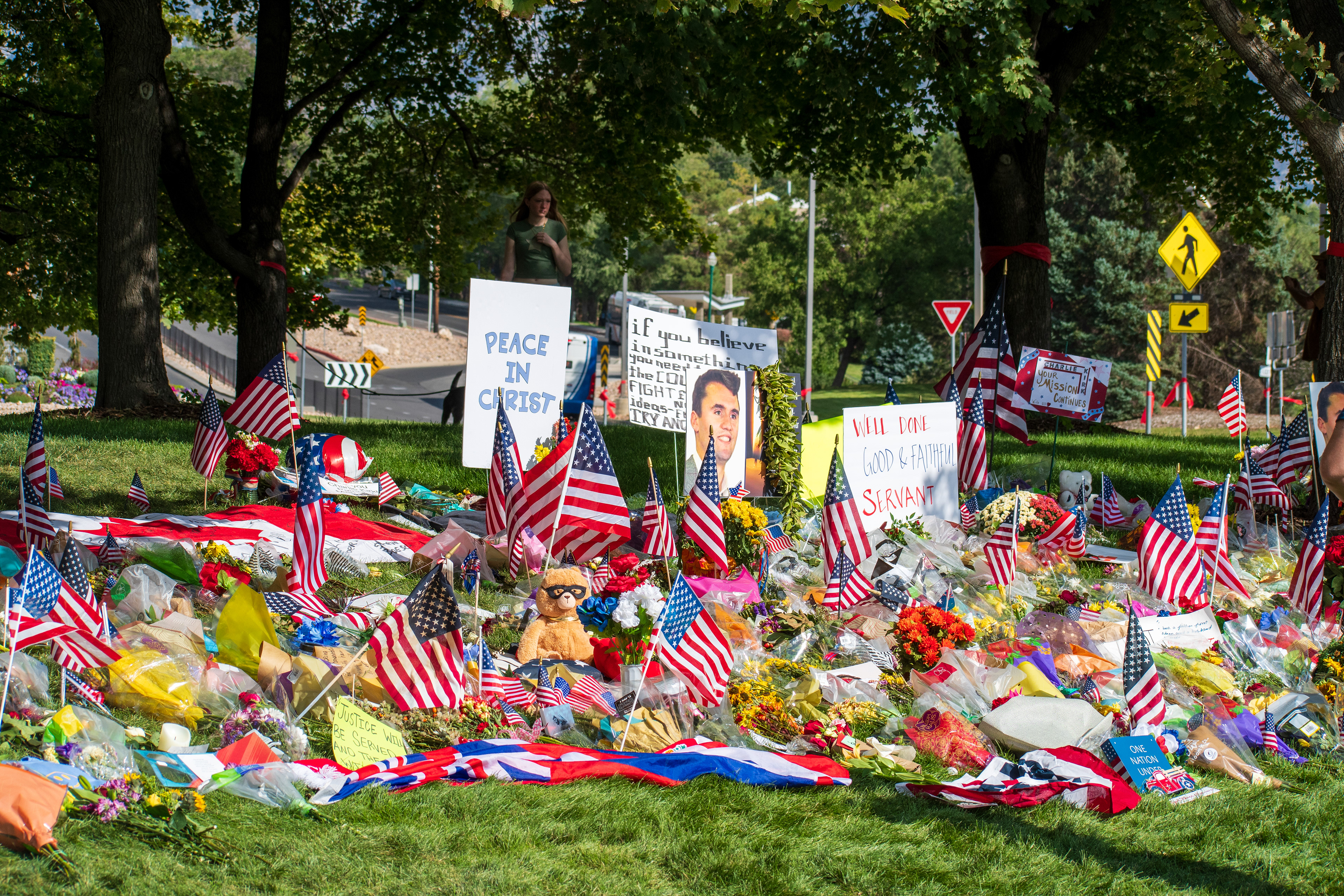 OREM, UTAH – SEPTEMBER 15, 2025: A memorial honoring Charlie Kirk is seen on the campus of Utah Valley University, featuring American flags, candles, flowers, and handwritten signs arranged around a large portrait. The tribute appeared days after Kirk’s final public event at the university. © Charles‑McClintock Wilson / ZUMA Press