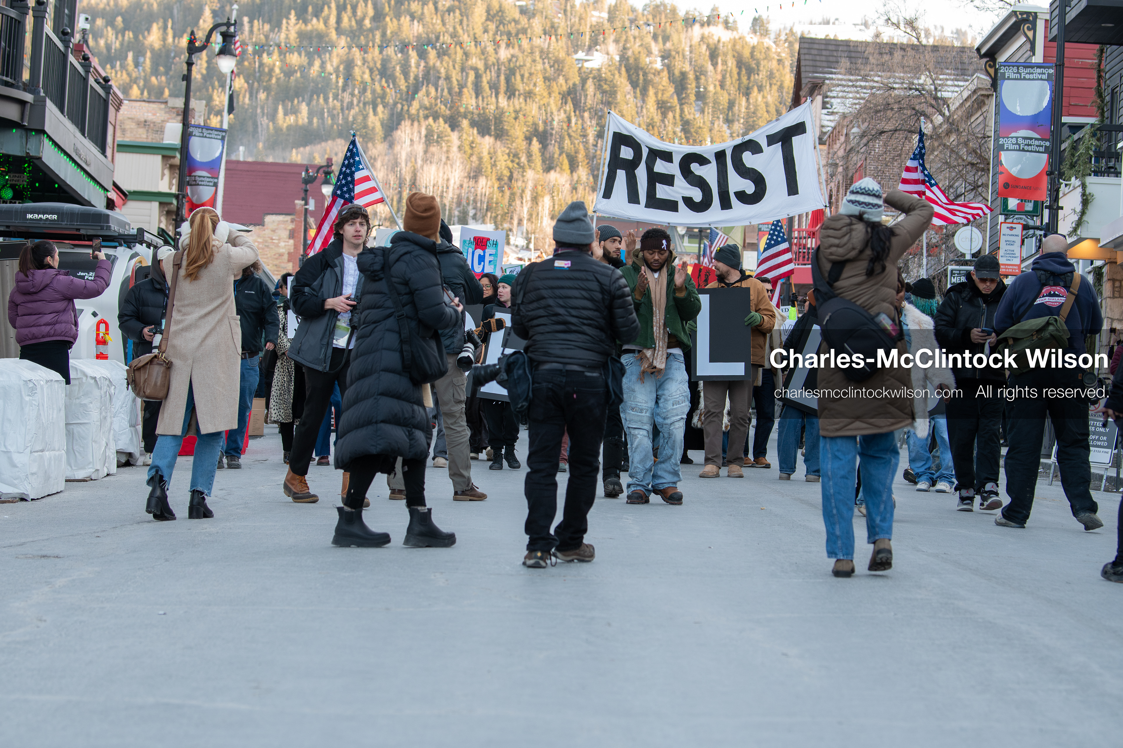 January 26, 2026, Park City, Utah, USA: Demonstrators march through Main Street holding signs during a protest opposing U.S. Immigration and Customs Enforcement (I.C.E.) ICE agents at the Sundance Film Festival in Park City, Utah, on Monday, Jan. 26, 2026. The event was held in response to the fatal shooting of Alex Pretti by a U.S. Border Patrol officer in Minneapolis. (Credit Image: © Charles McClintock Wilson/ZUMA Press Wire)