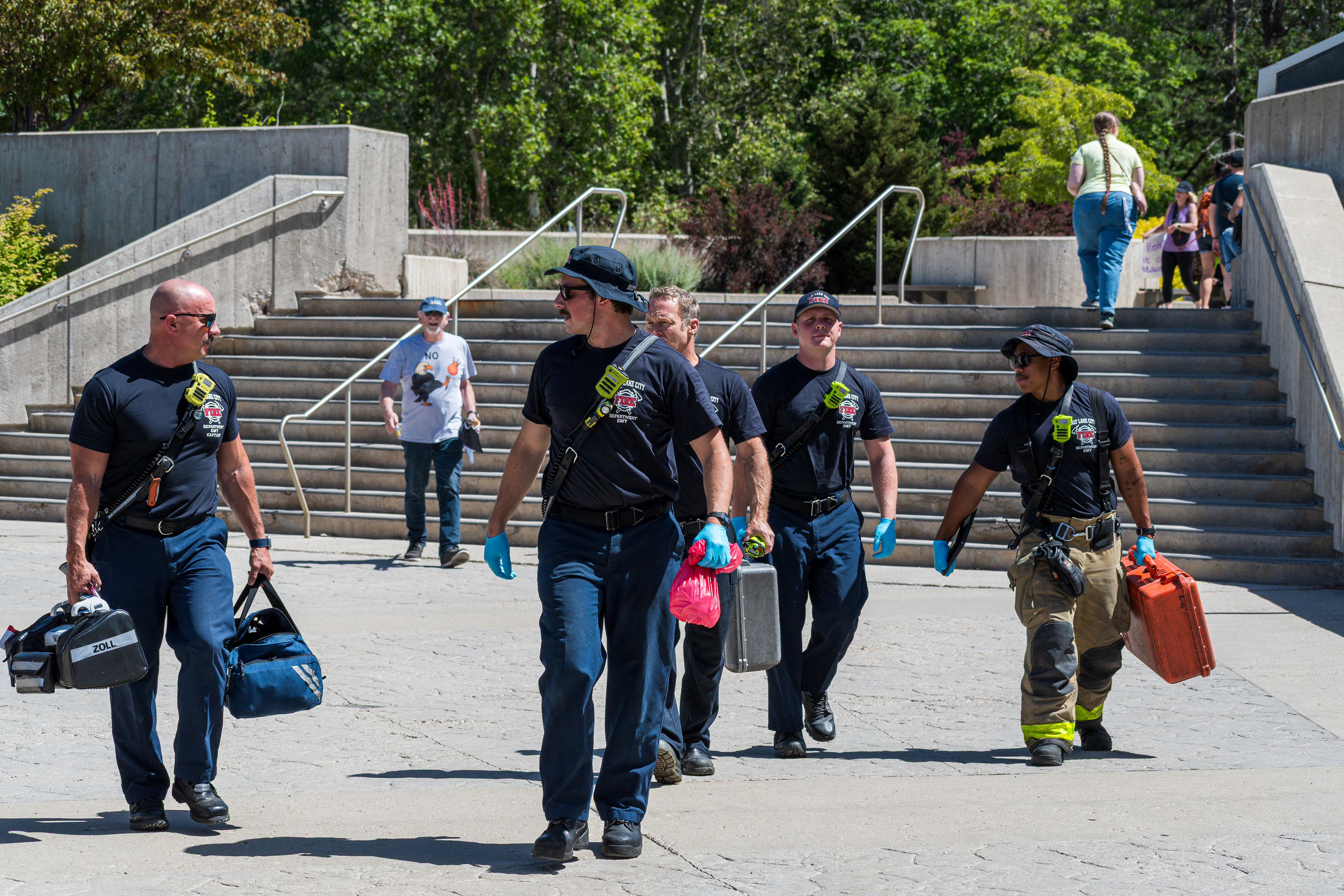 SALT LAKE CITY, UTAH – JUNE 15, 2025: Firefighters arrive at the University of Utah during the “No Kings” protest to provide support and ensure public safety.