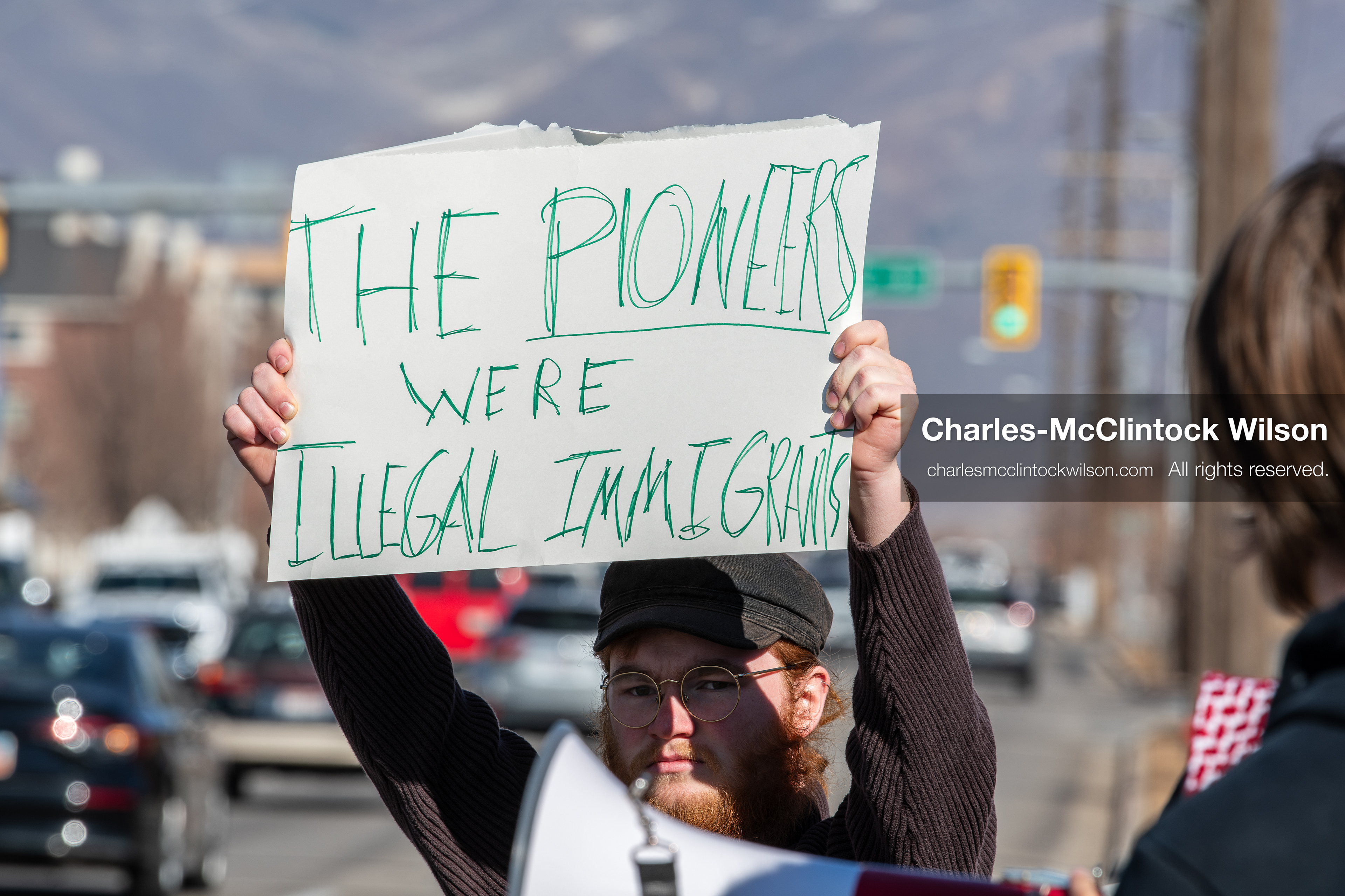 February 5, 2026, Provo, Utah, USA: A demonstrator holds a sign during a gathering near Brigham Young University in Provo where students and community members protested the presence of US Customs and Border Protection recruiters at a career fair held on the BYU campus. (Credit Image: © Charles McClintock Wilson/ZUMA Press Wire)