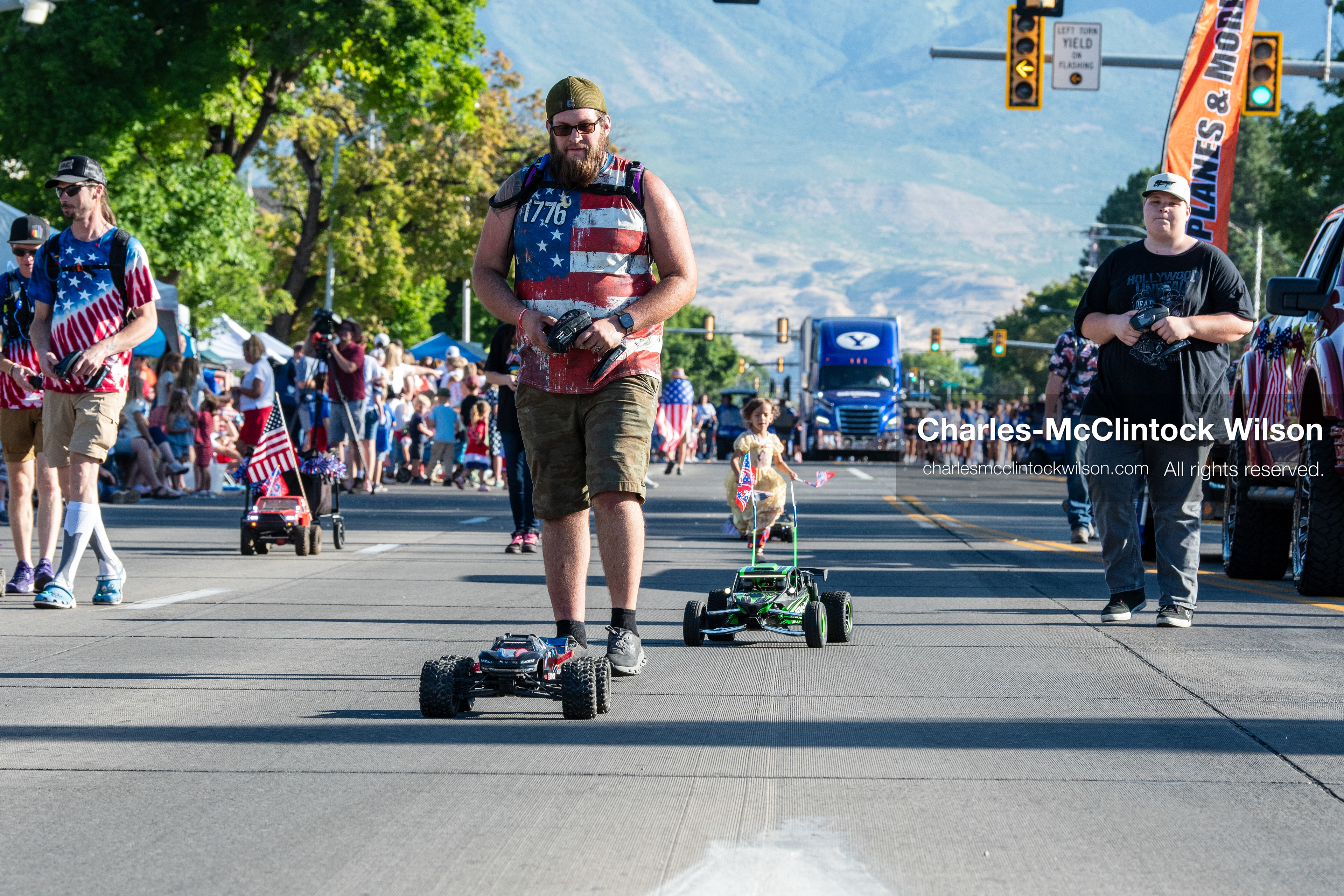 July 4, 2026, Provo, Utah, USA: Remote-controlled car enthusiasts operate RC monster trucks along the route during America's Freedom Festival Grand Parade in Provo, Utah, Saturday, July 4, 2026. The annual Independence Day event features expanded programming to honor the 250th anniversary of United States independence. (Credit Image: © Charles-McClintock Wilson/ZUMA Press Wire)