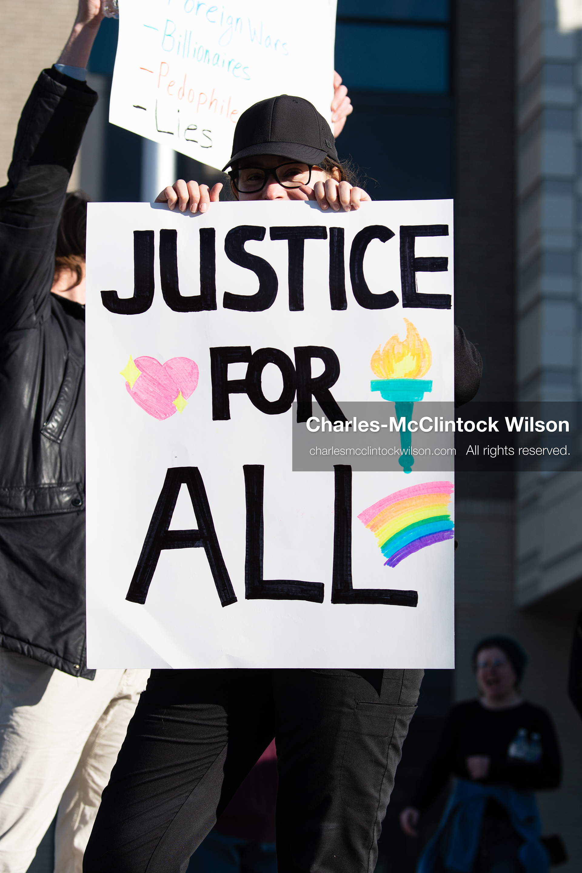  January 20, 2026, Provo, Utah, USA: A demonstrator stands outside Provo City Hall during the Free America Walkout protest in Provo Utah on January 20 2026. The nationwide event called for immigration reform and changes to detention practices.