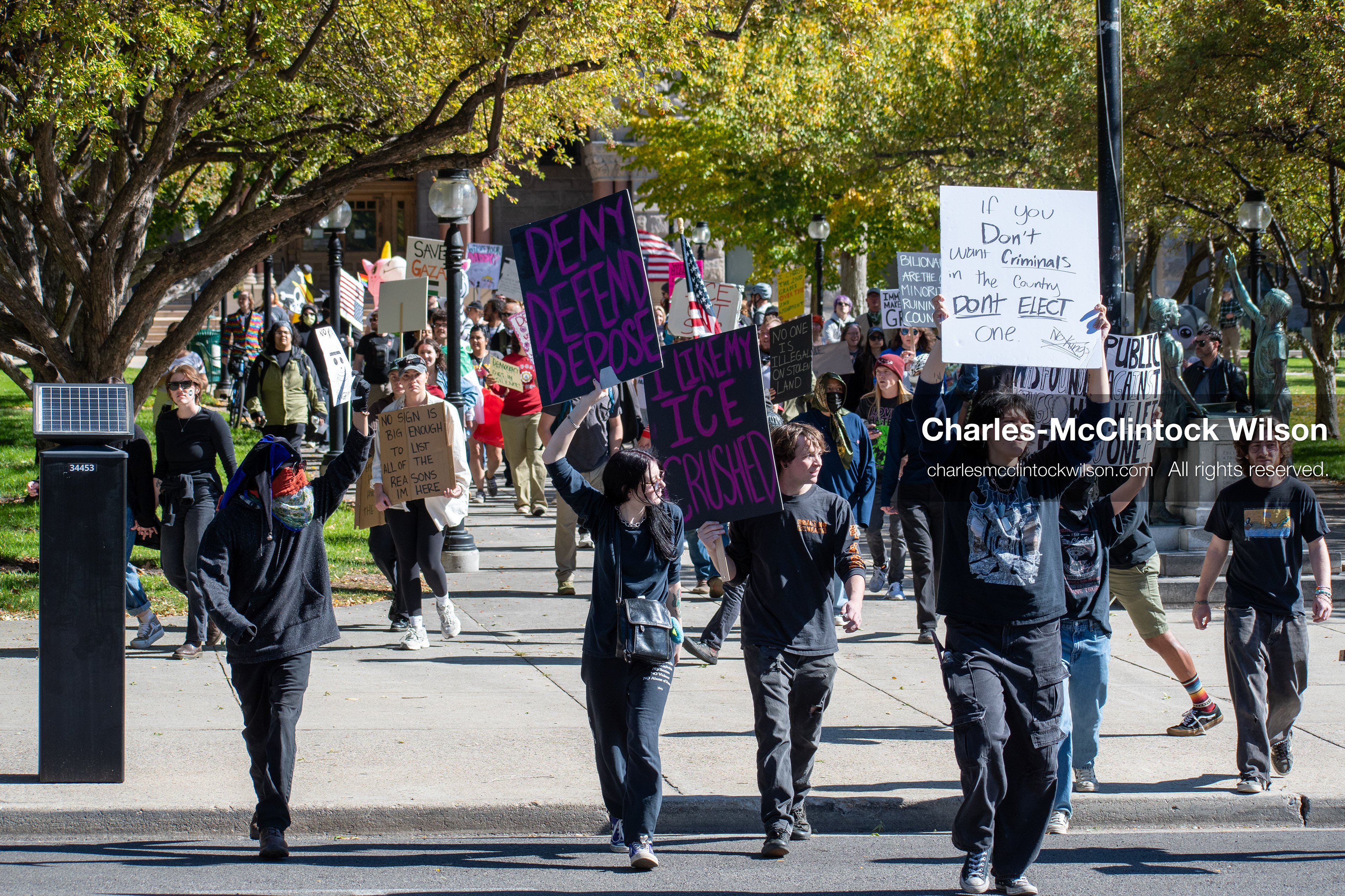 October 18, 2025, Salt Lake City, Utah, USA: Demonstrators march along South State Street during a "No Kings" protest in Salt Lake City, Utah. The protest was part of a nationwide mobilization.
