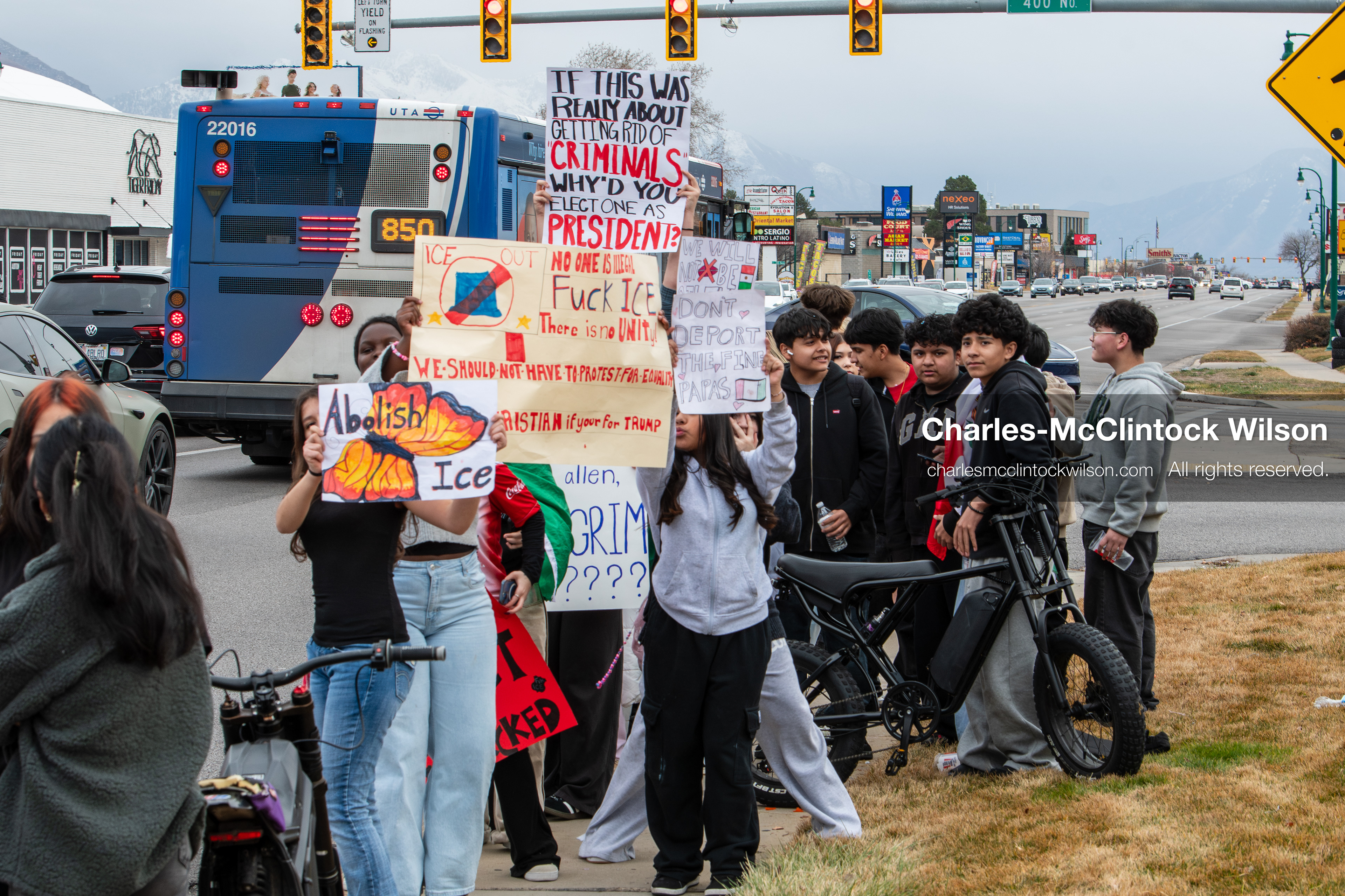 February 11, 2026, Orem, Utah, USA: Students stand on the sidewalk along State Street during a student‑led protest involving participants from multiple Orem schools. (Credit Image: © Charles‑McClintock Wilson/ZUMA Press Wire)
