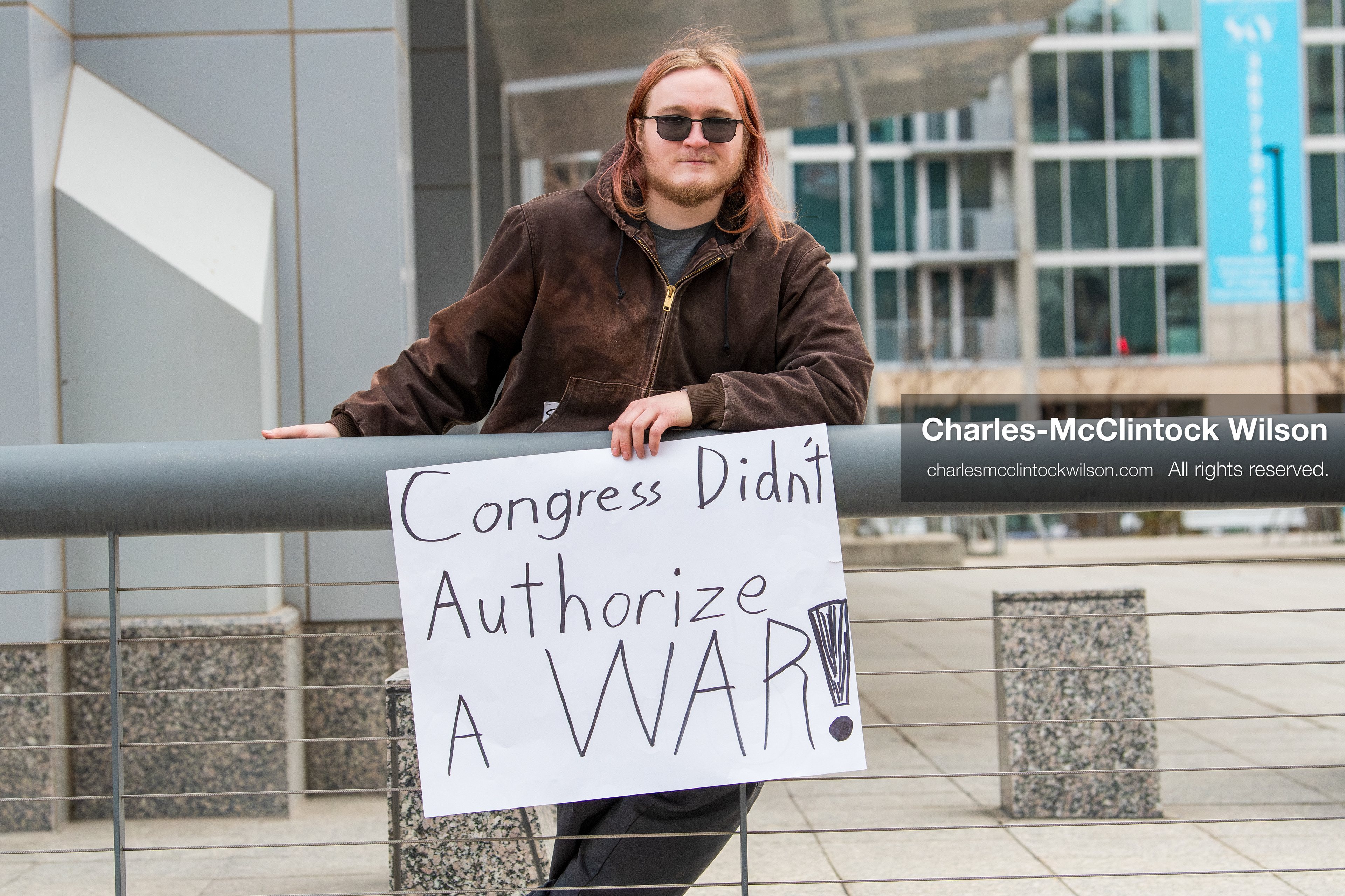 January 3, 2026, Salt Lake City, Utah, USA: A protester holds a sign during a demonstration against US action in Venezuela outside the Wallace Federal Building in Salt Lake City, Utah. The protest was part of a nationwide mobilization responding to recent military developments. (Credit Image: (c) Charles‑McClintock Wilson/ZUMA Press Wire)