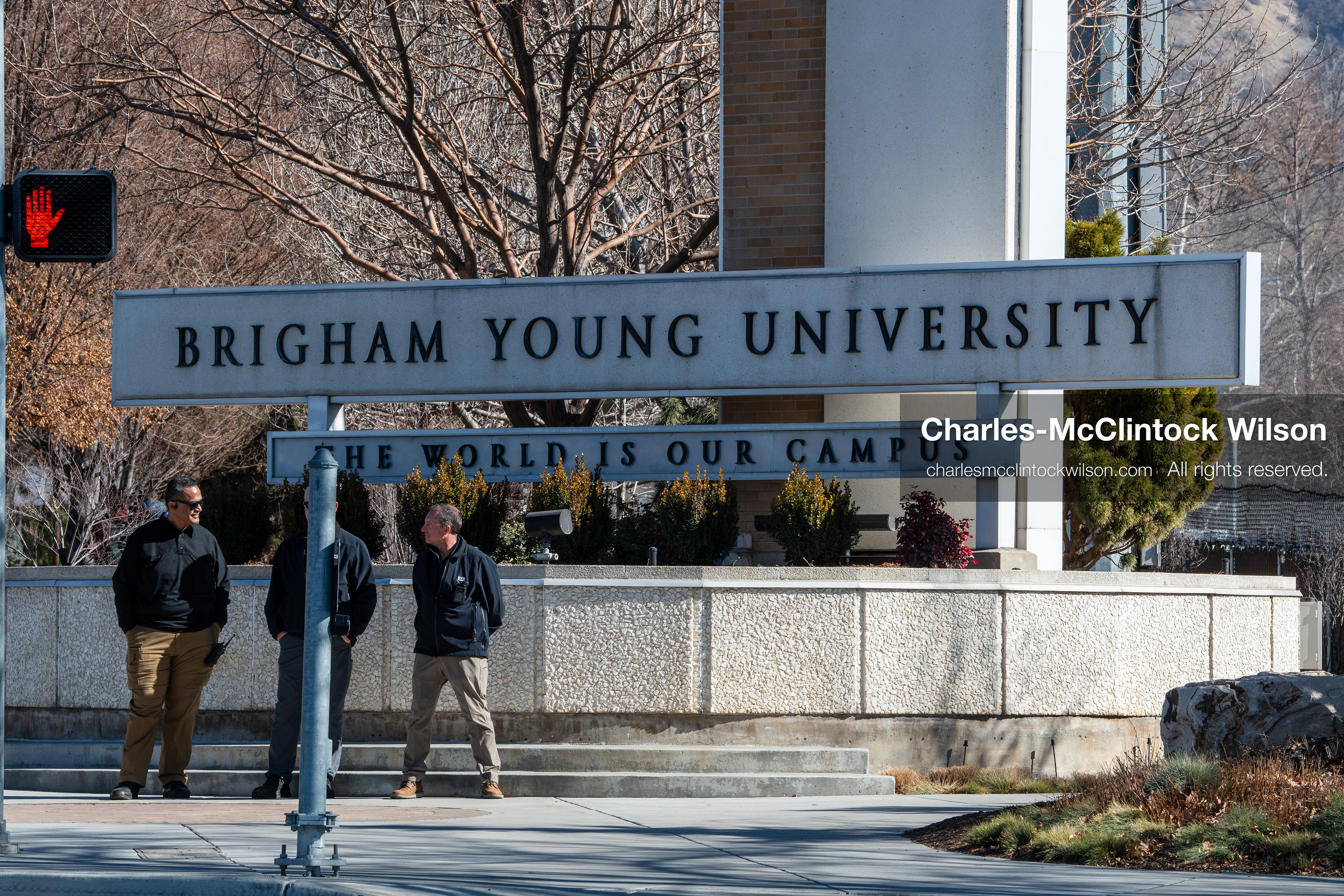 February 5, 2026, Provo, Utah, USA: People stand near an entrance sign at Brigham Young University in Provo during a protest opposing the presence of US Customs and Border Protection recruiters at a career fair held at the university. (Credit Image: © Charles McClintock Wilson/ZUMA Press Wire)