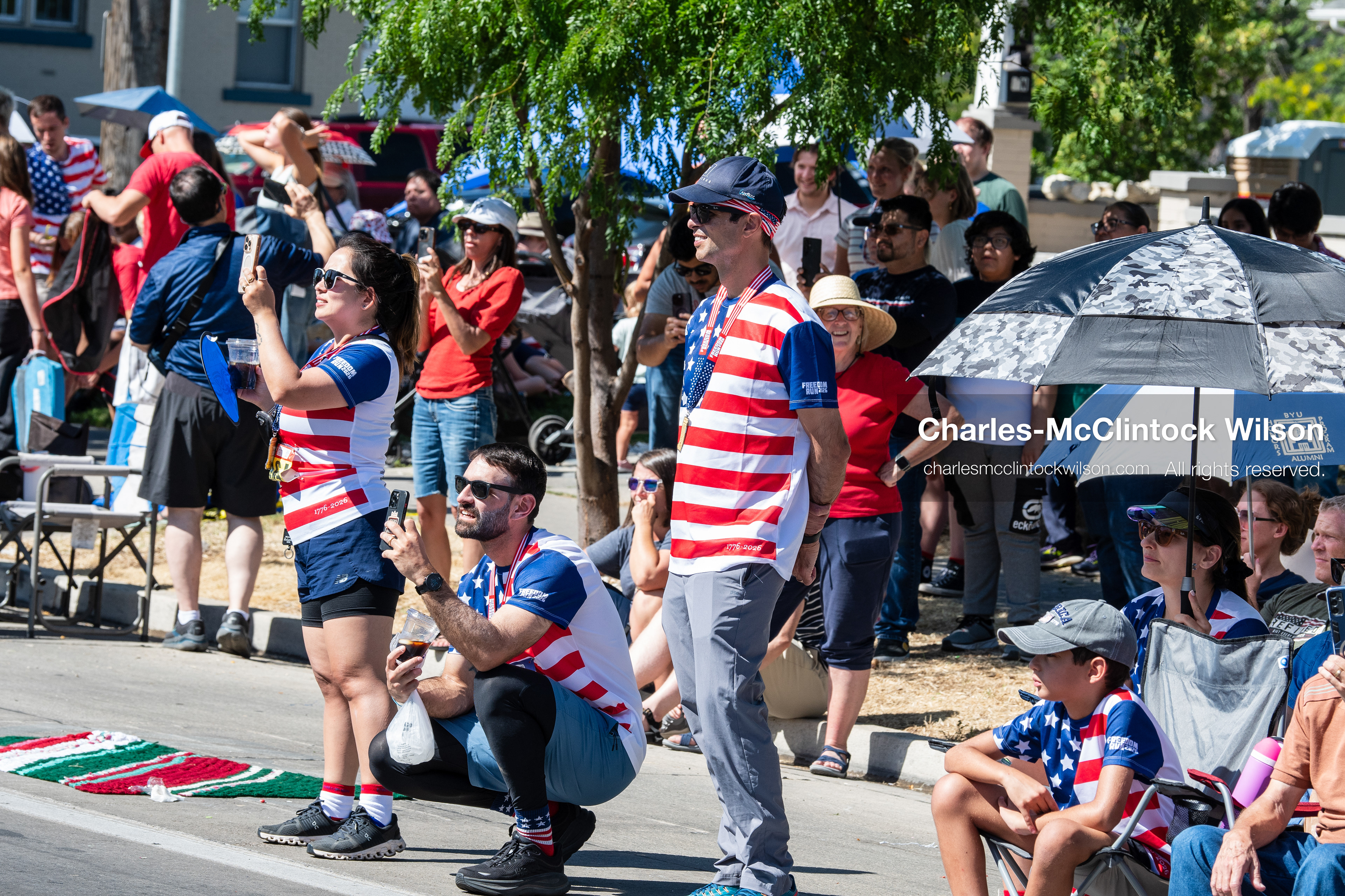 July 4, 2026, Provo, Utah, USA: Spectators and children gather along the sidewalk to watch America's Freedom Festival Grand Parade in Provo, Utah, Saturday, July 4, 2026. The annual Independence Day event features expanded programming to honor the 250th anniversary of United States independence. (Credit Image: © Charles-McClintock Wilson/ZUMA Press Wire)
