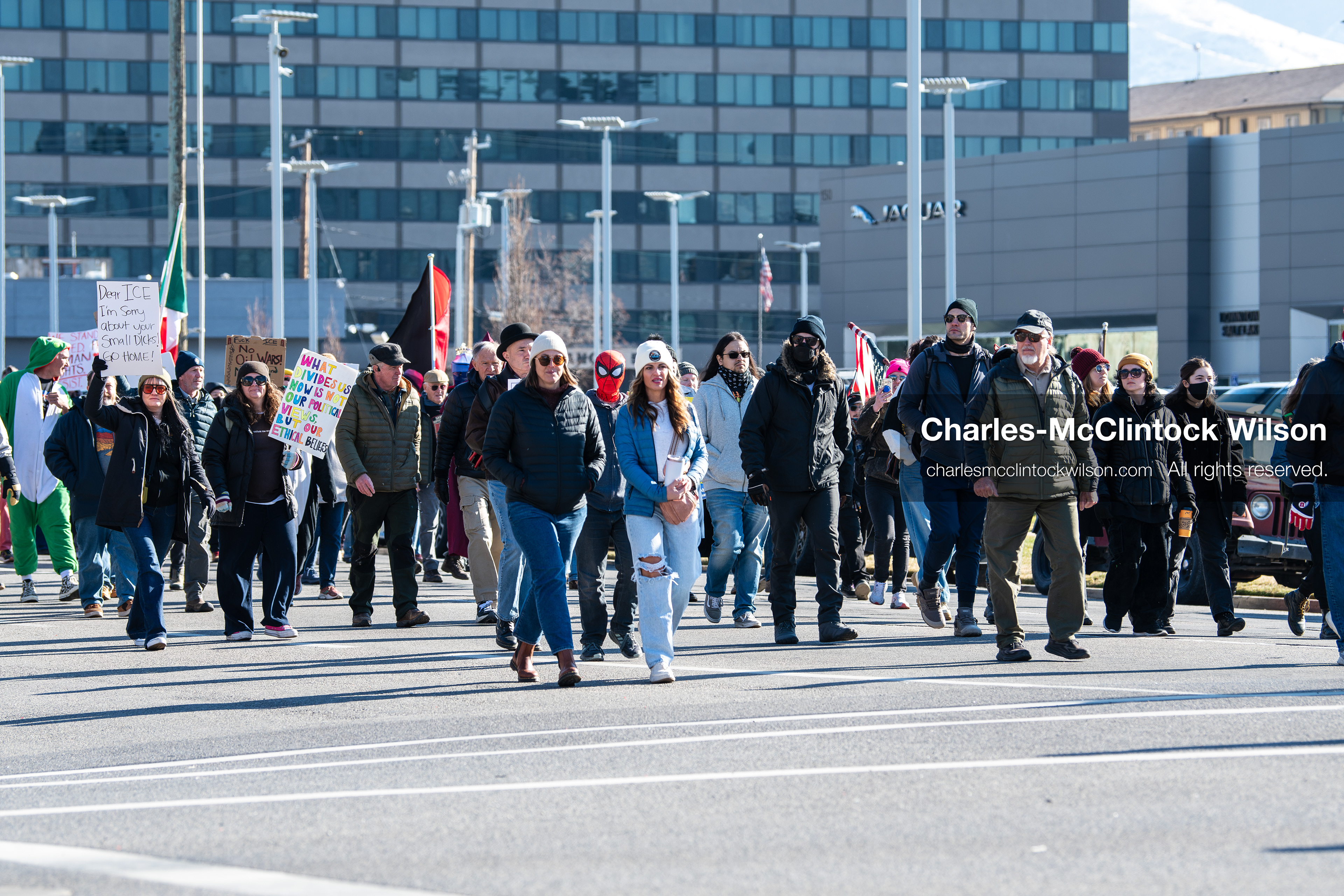 Salt Lake City, Utah, January 10, 2026: A group of demonstrators marches through downtown Salt Lake City during the ICE Out for Good protest, which began at Washington Square Park, with participants carrying signs and personal items as they walk together. (Credit Image: © Charles‑McClintock Wilson/ZUMA Press Wire)