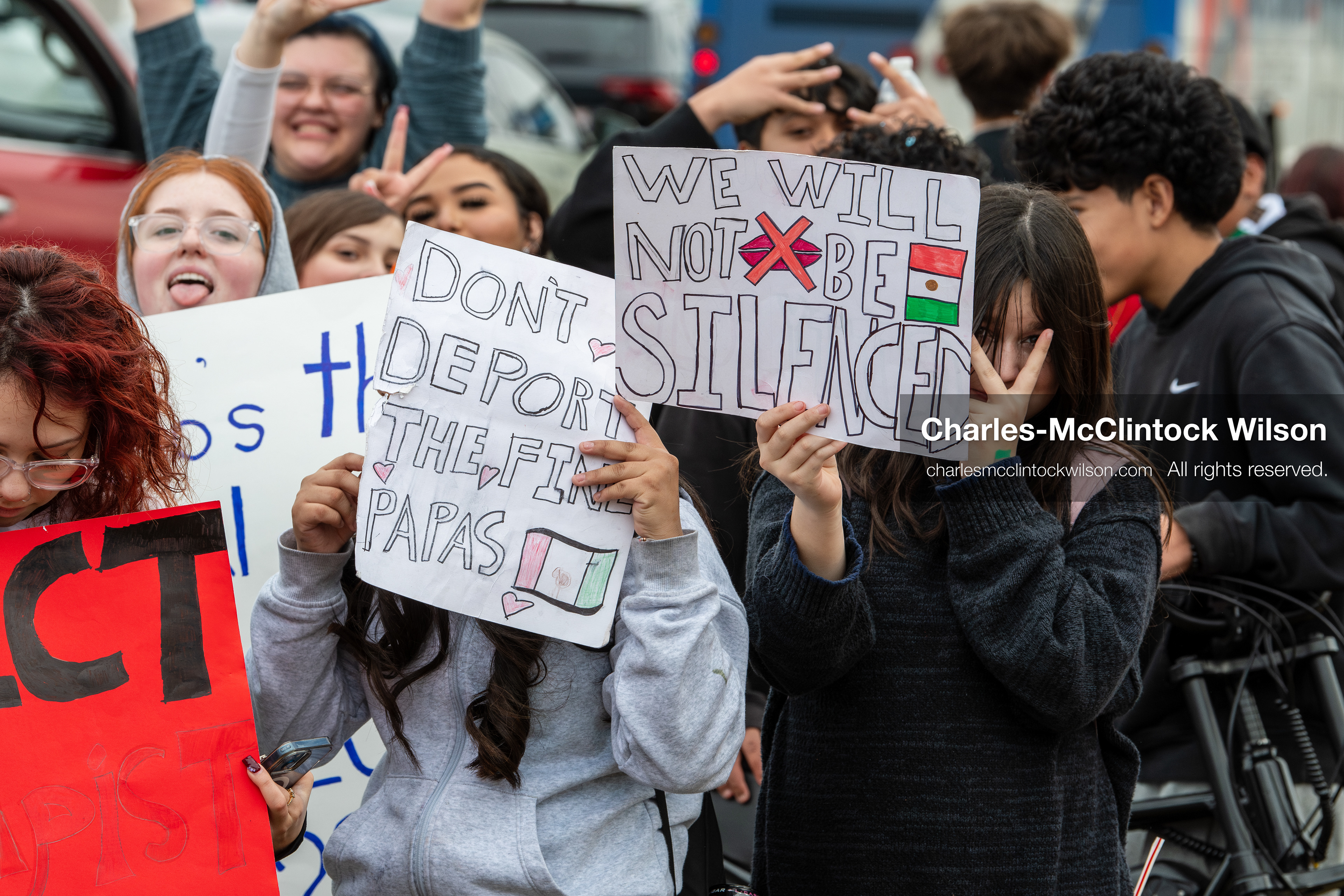 February 11, 2026, Orem, Utah, USA: Students stand on the sidewalk along State Street during a student‑led protest involving participants from multiple Orem schools. (Credit Image: © Charles‑McClintock Wilson/ZUMA Press Wire)